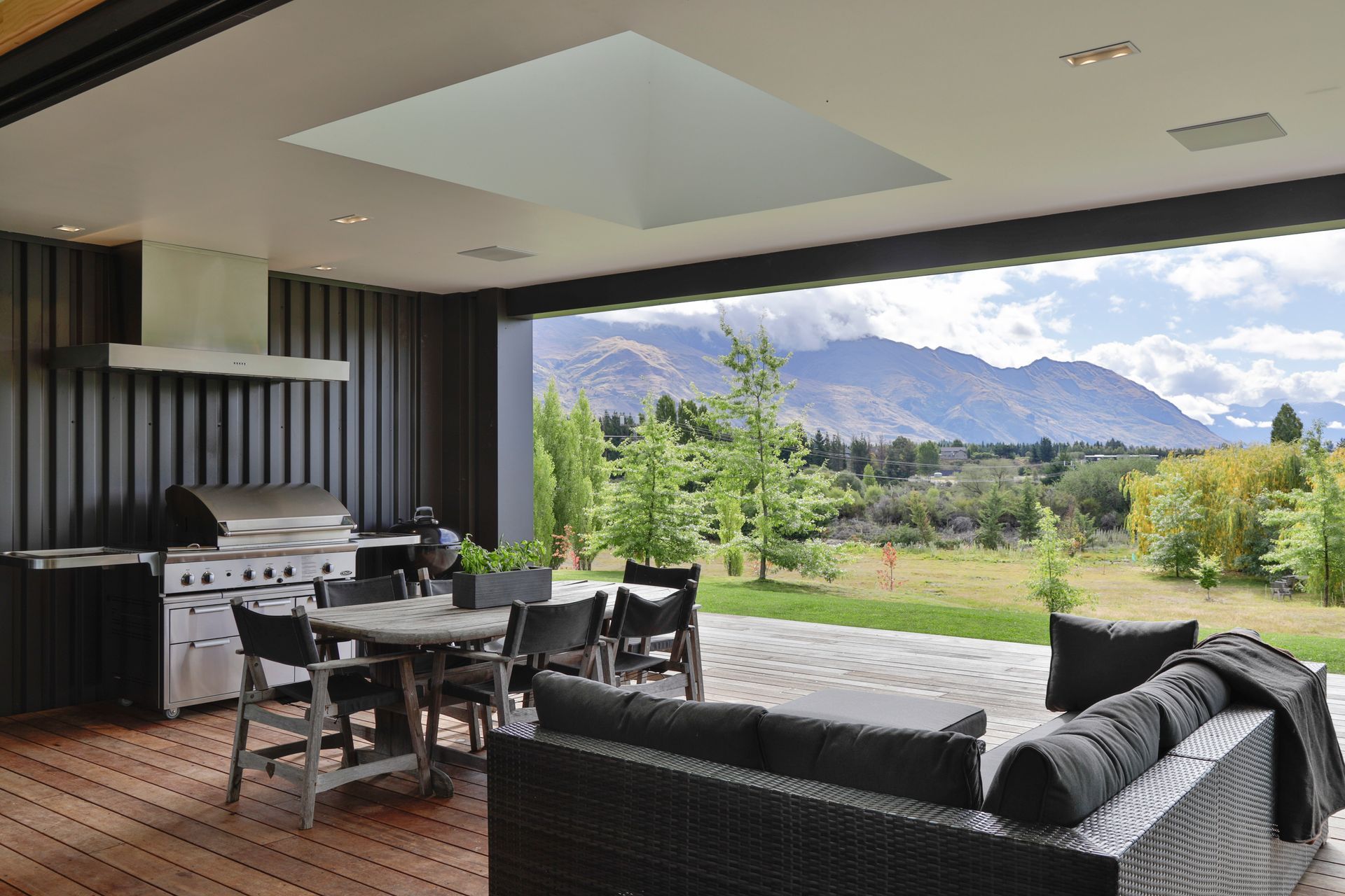 A sheltered outdoor living space with spectacular mountain views