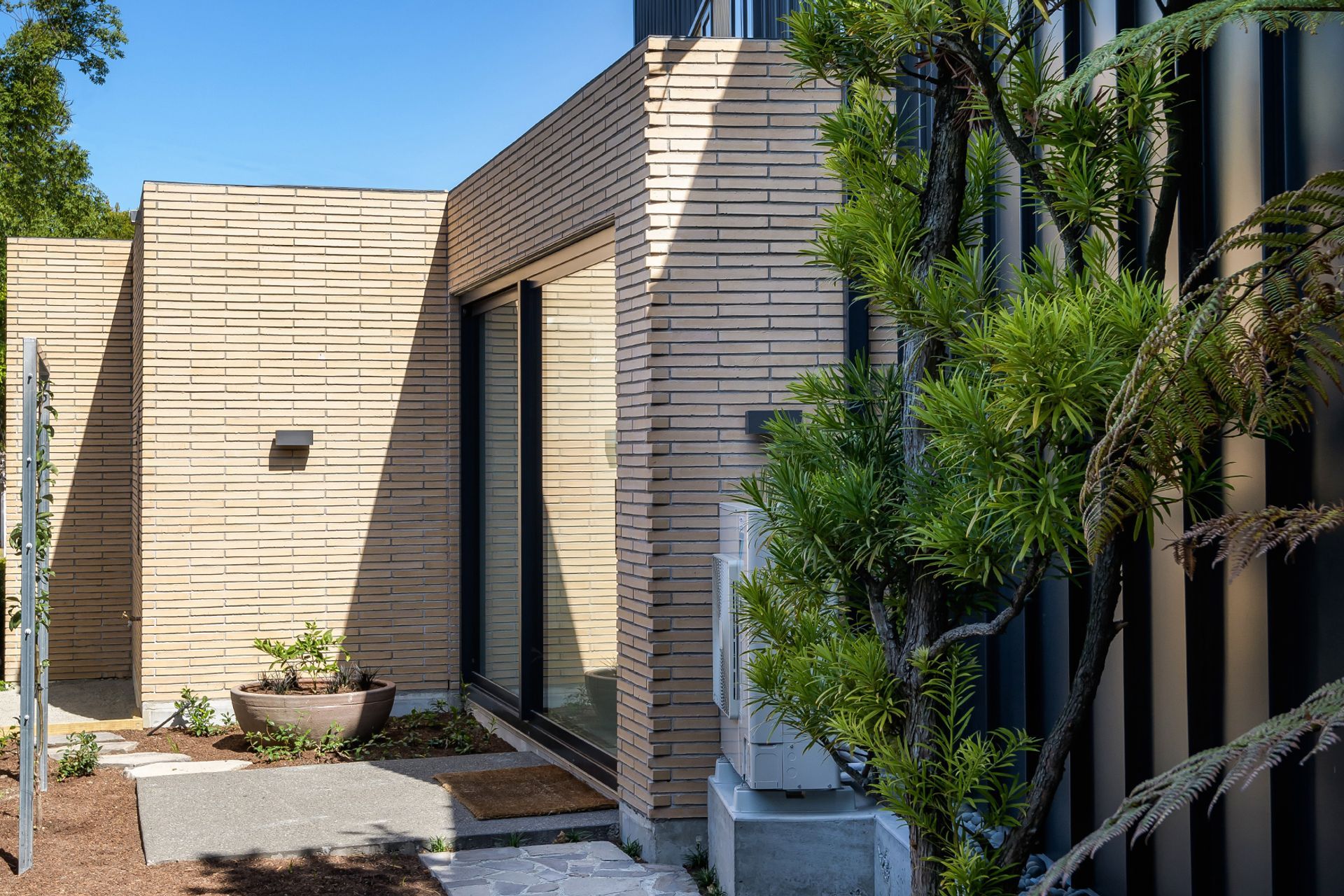 Brick cladding creates interesting patterns and textures with a durable material.