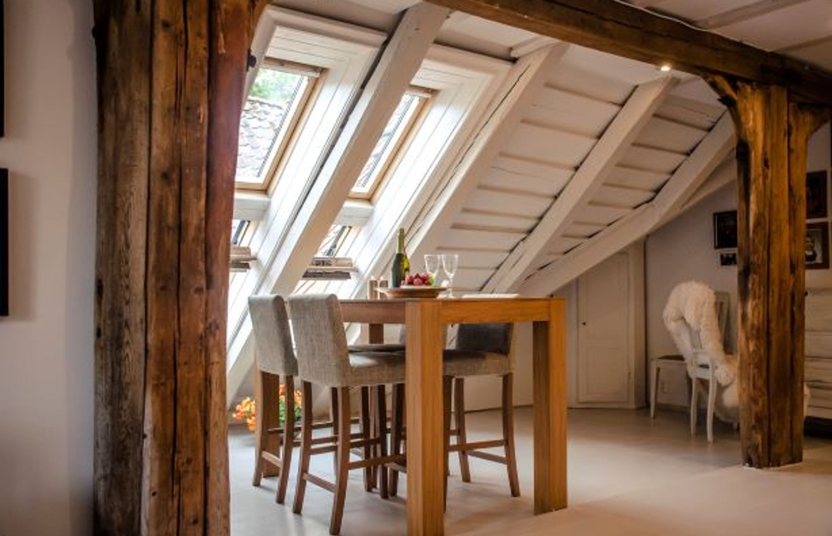 The skylights in this roof conversion makes the space look bigger and more open