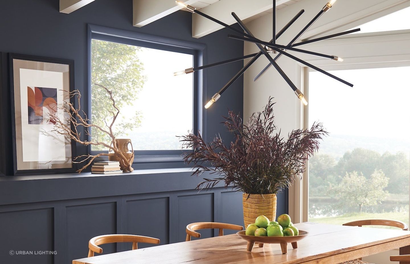 The versatile and contemporary Archer Pendant with articulating arms in satin black with brushed nickel accents