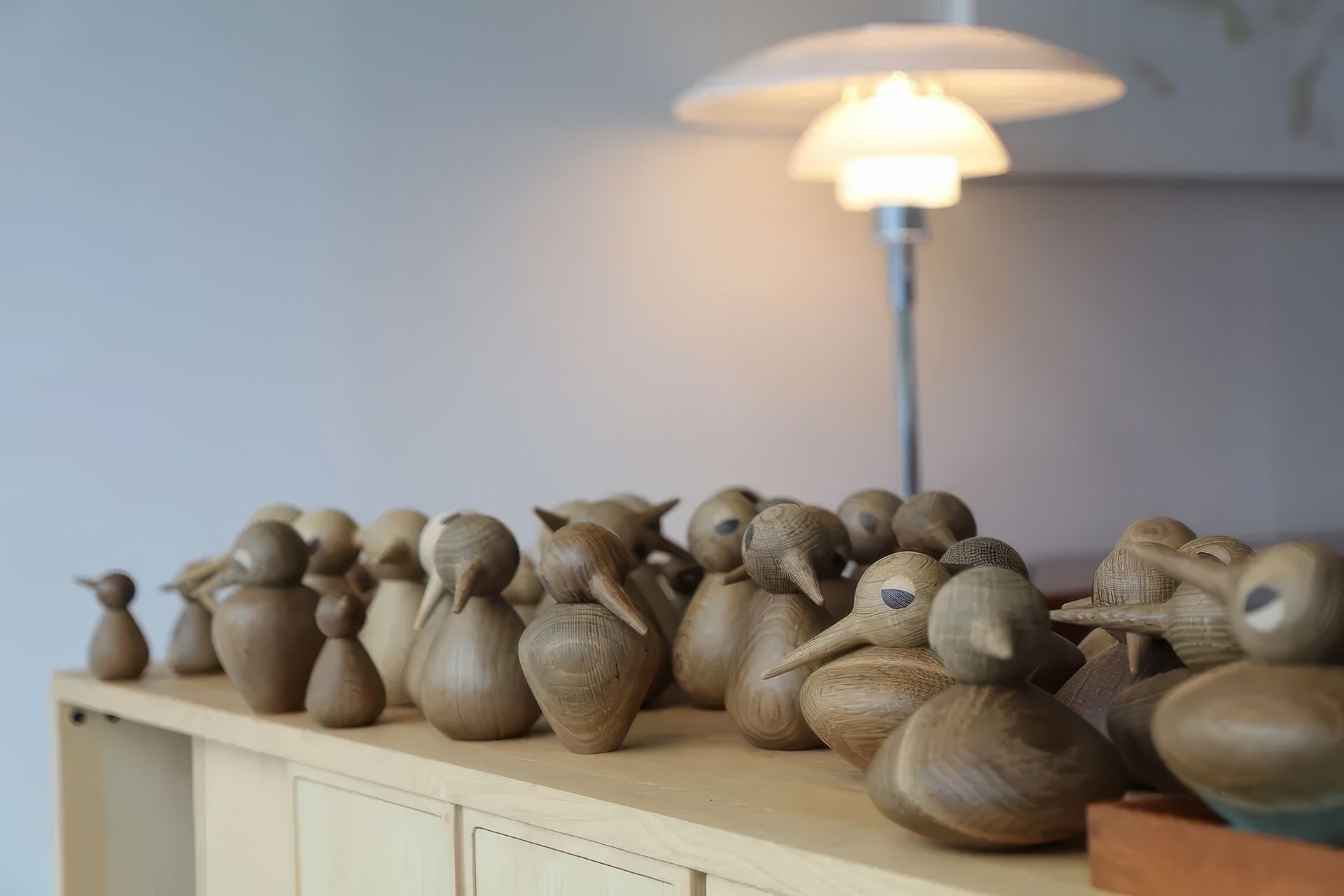 Kristian Vedel birds featured with the Ercol Canvas Sideboard, in our window at the Good Form gallery.