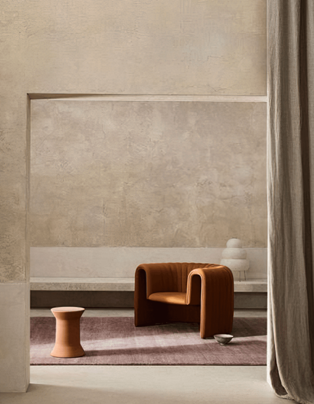 Image Credit:  Armadillo | Warm neutral walls in venetian plaster + organic furniture forms