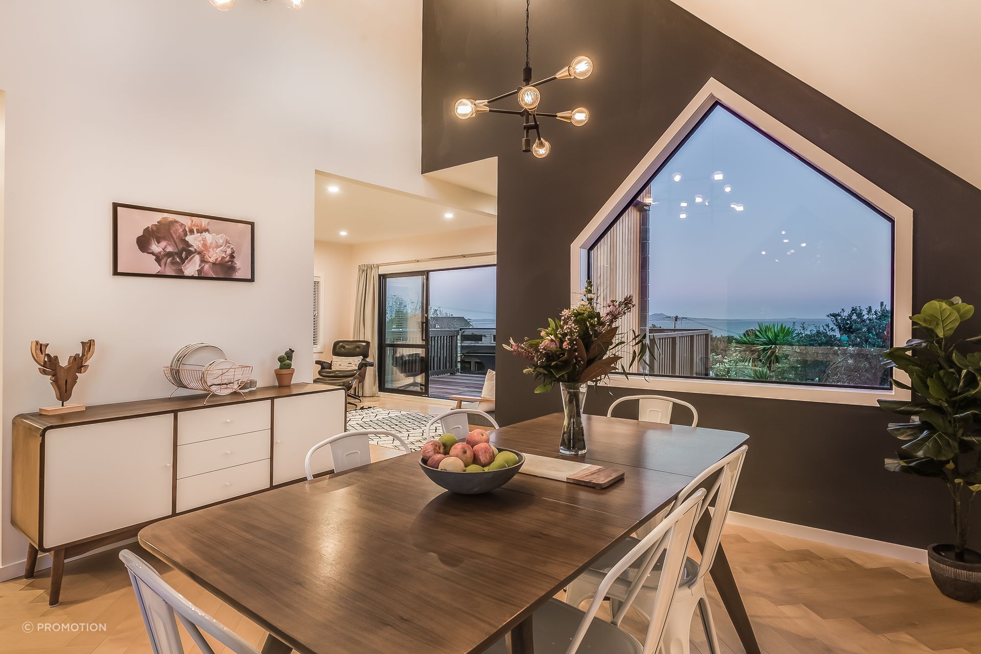 Black and white throughout the house makes a bold statement. “The white looks clean and simple then the contrast lets a feature be a feature.”