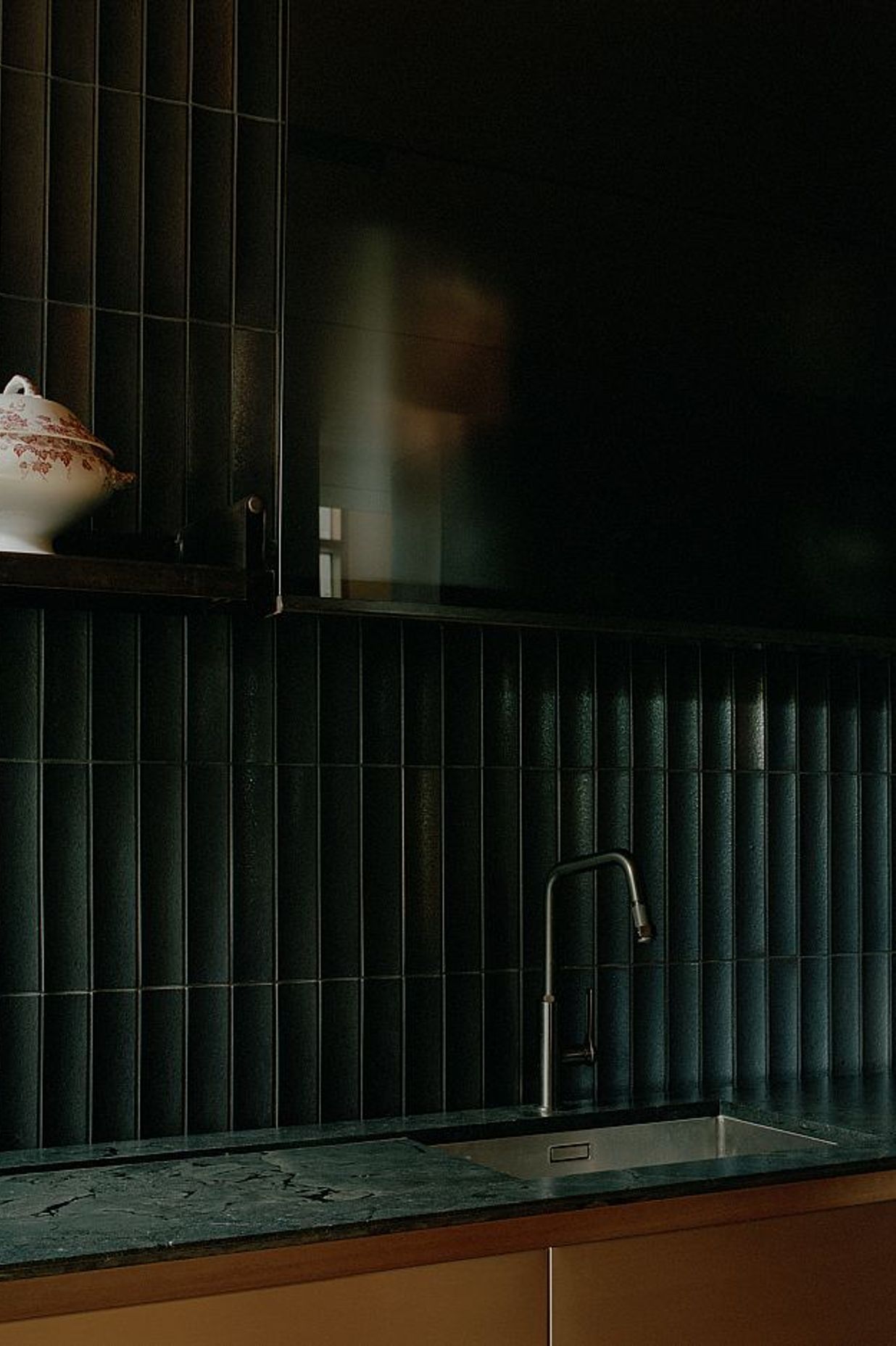 Custom Wakai Tajimi scalloped tiles on kitchen wall. Kew Residence by John Wardle Architects