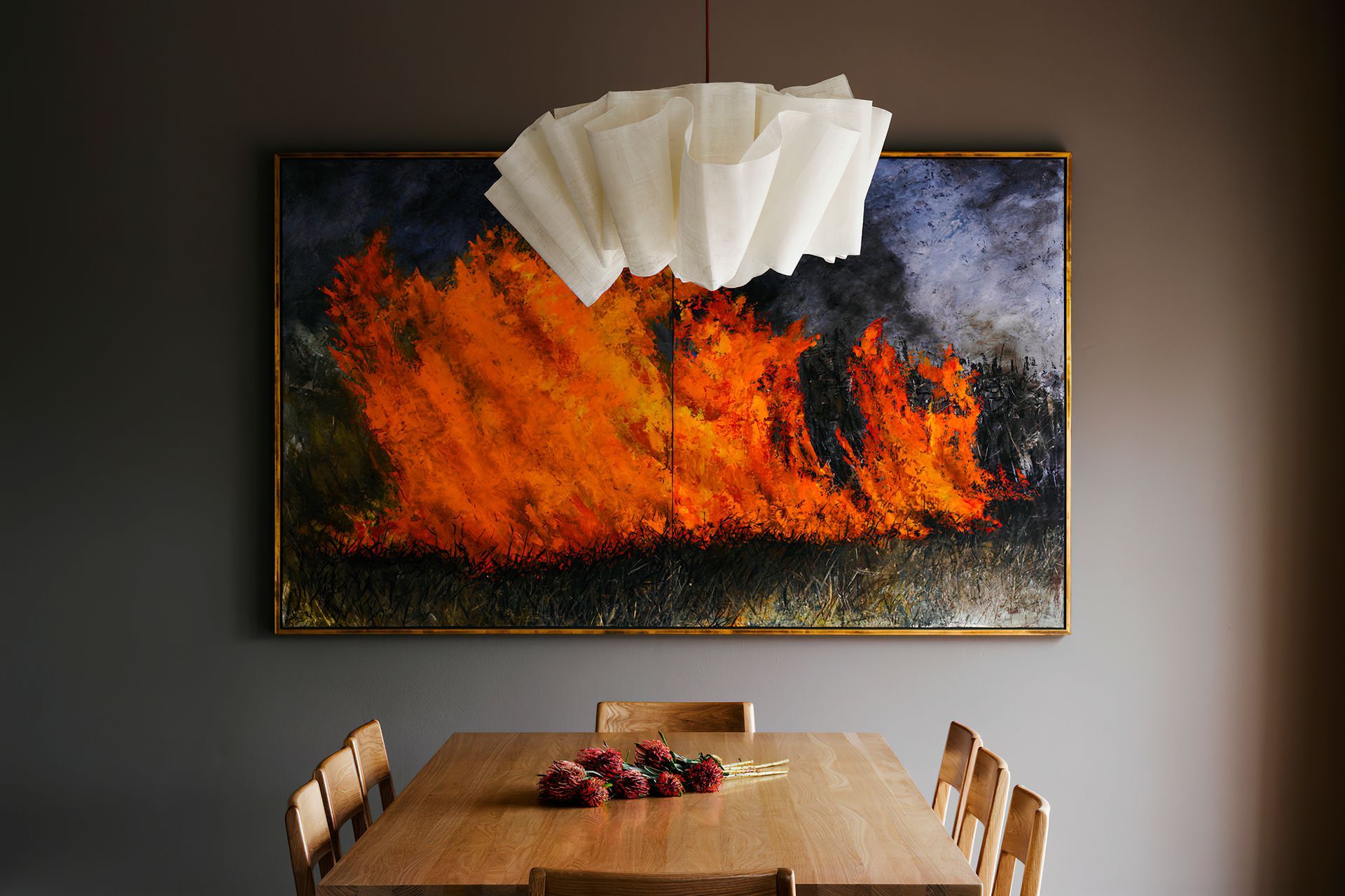 Striking wall art can brath life and emotion into a dining room.