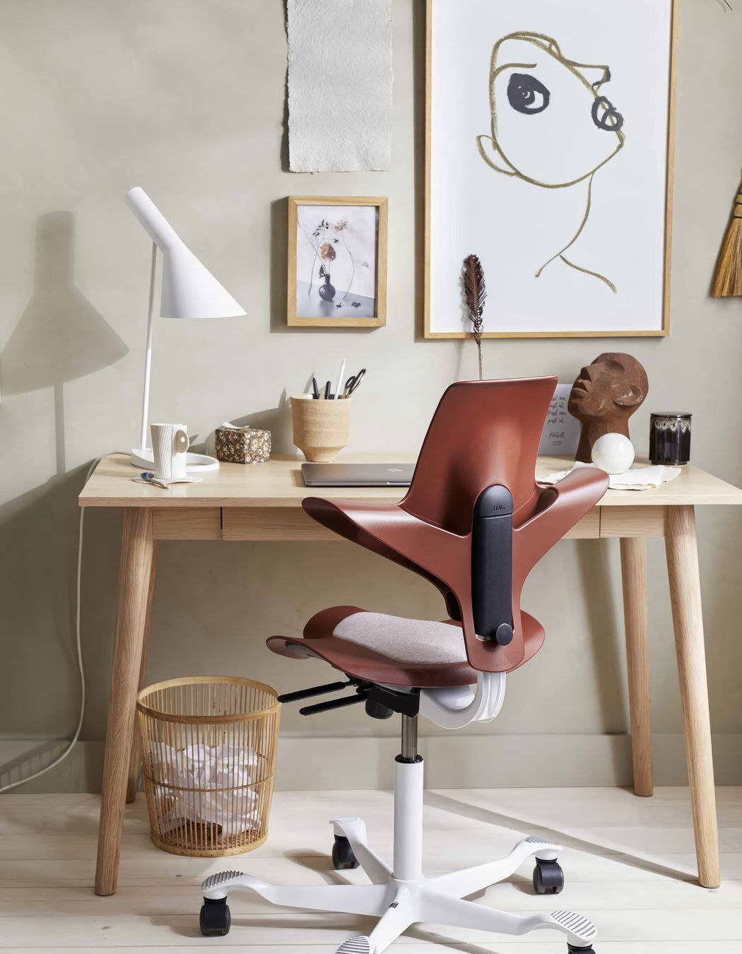 HÅG Capisco Puls is a chair designed by Flokk available with a plastic seat and back made from 100% recycled plastic, sourced from broken snow plough markers.