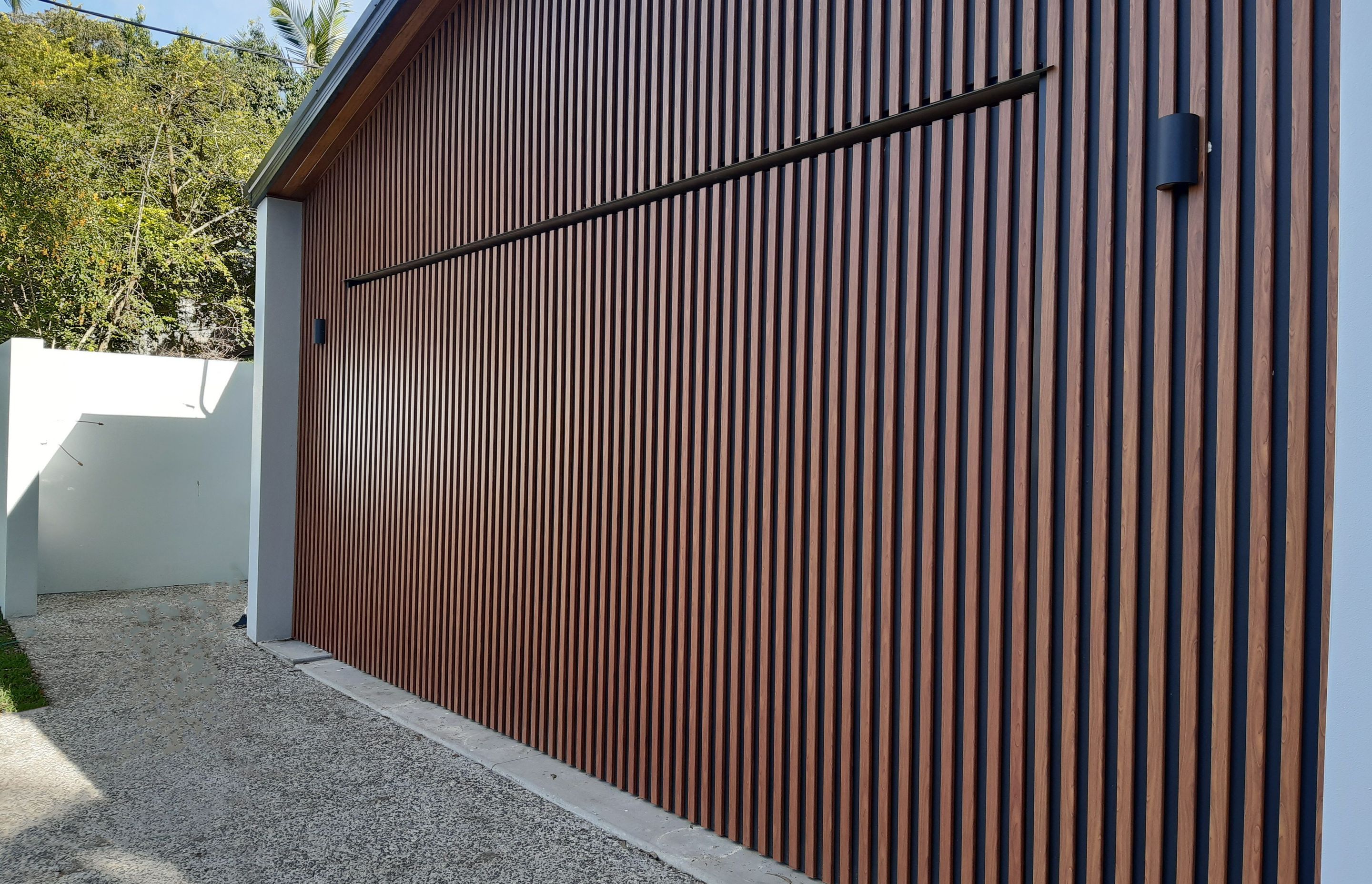 The Pros + Cons of a Tilt Garage Door: Is it Right for You?