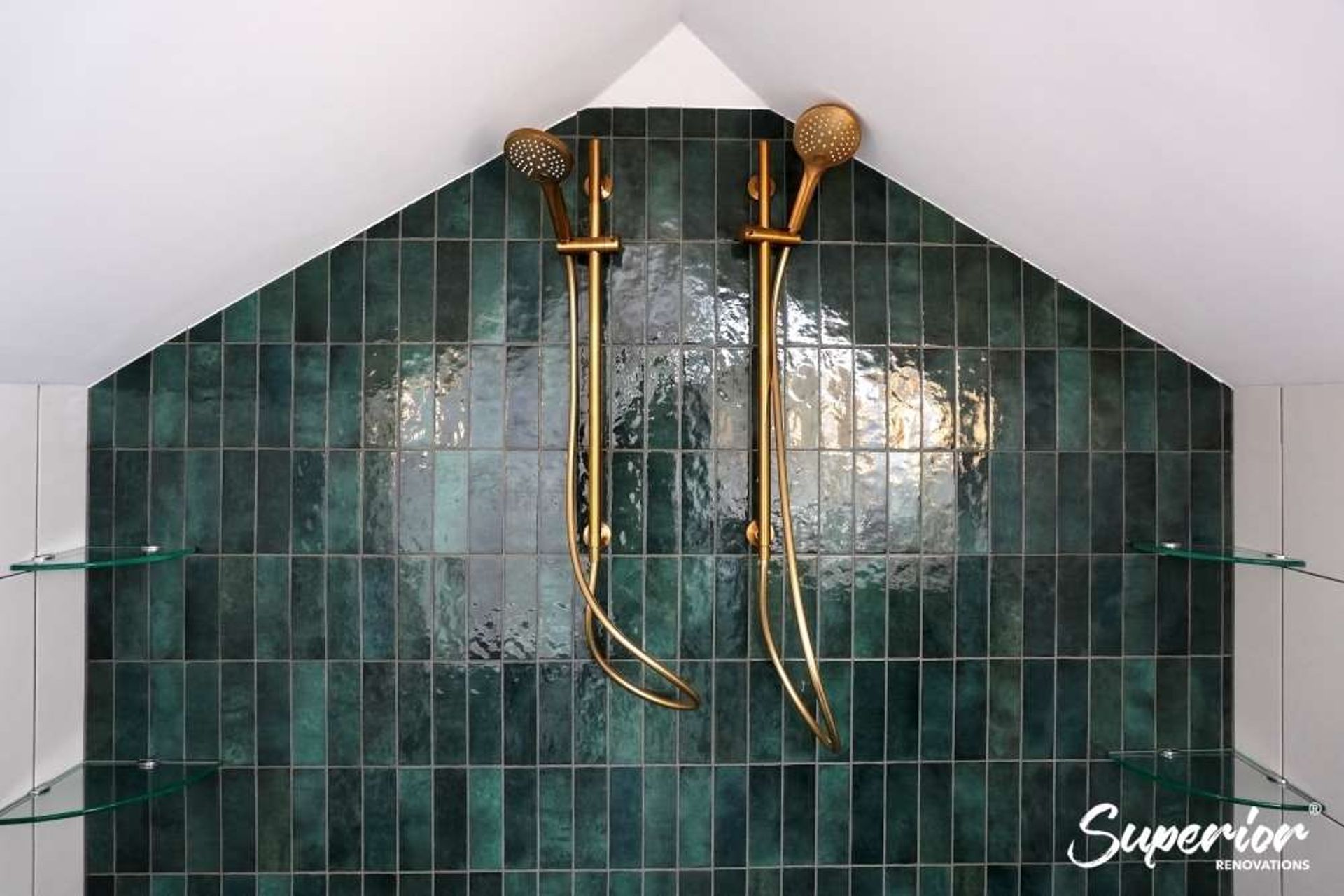 Green Casablana tiles installed in one of the walls of the shower to add some drama in the bathroom (Bathroom renovation in Westmere)