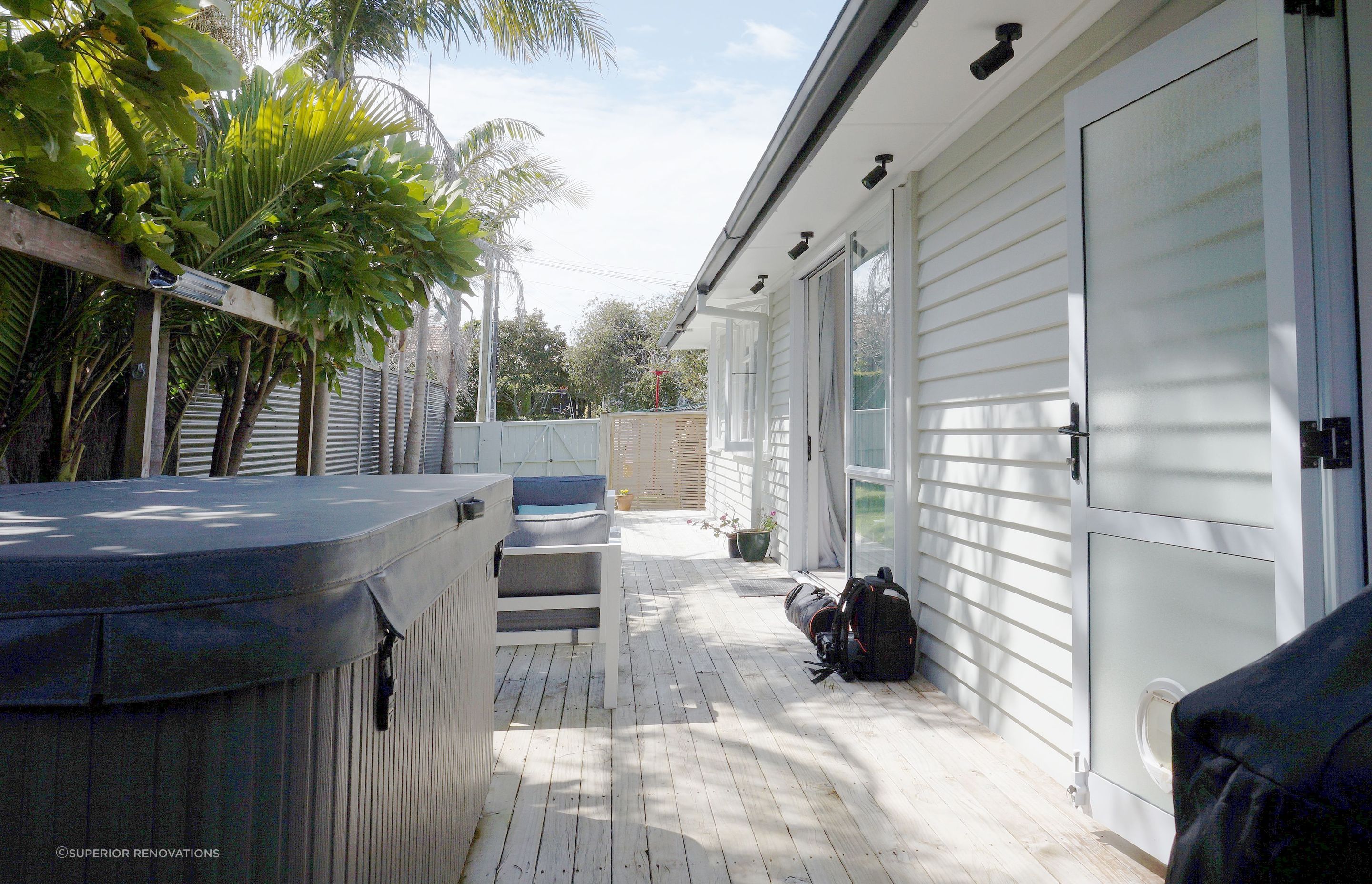 A deck was created around the house to extend the living space for the client.