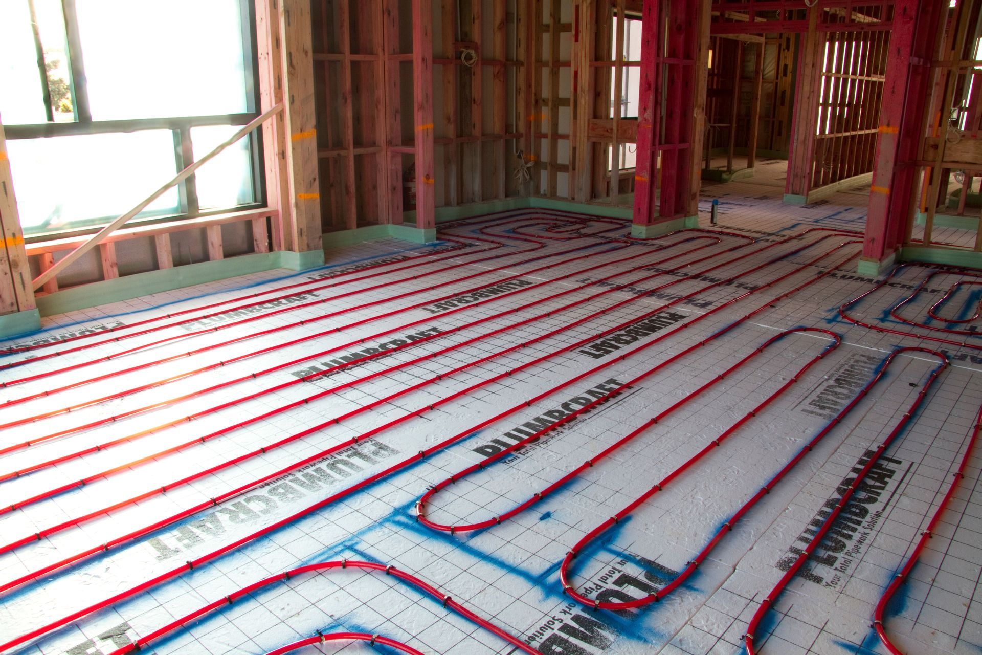 Instead of using radiators to heat a room, Underfloor Heating uses hot water pipes that warm the slab or floor, heating the room from the ground up.