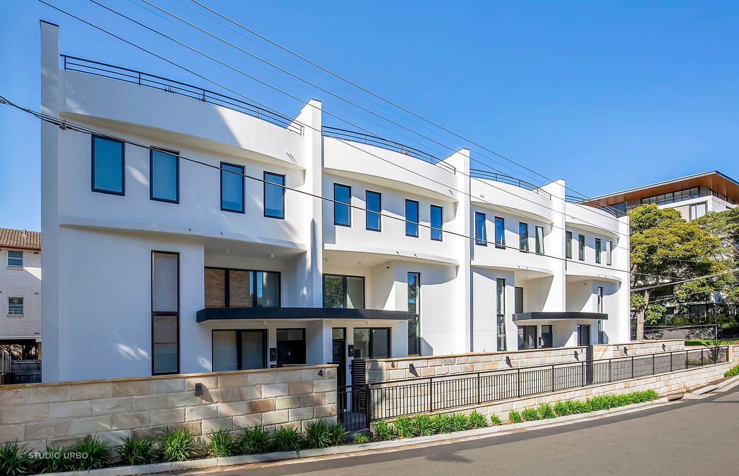 The inviting entrances of these townhouses in Lane Cove. Photography: by Real Studios.