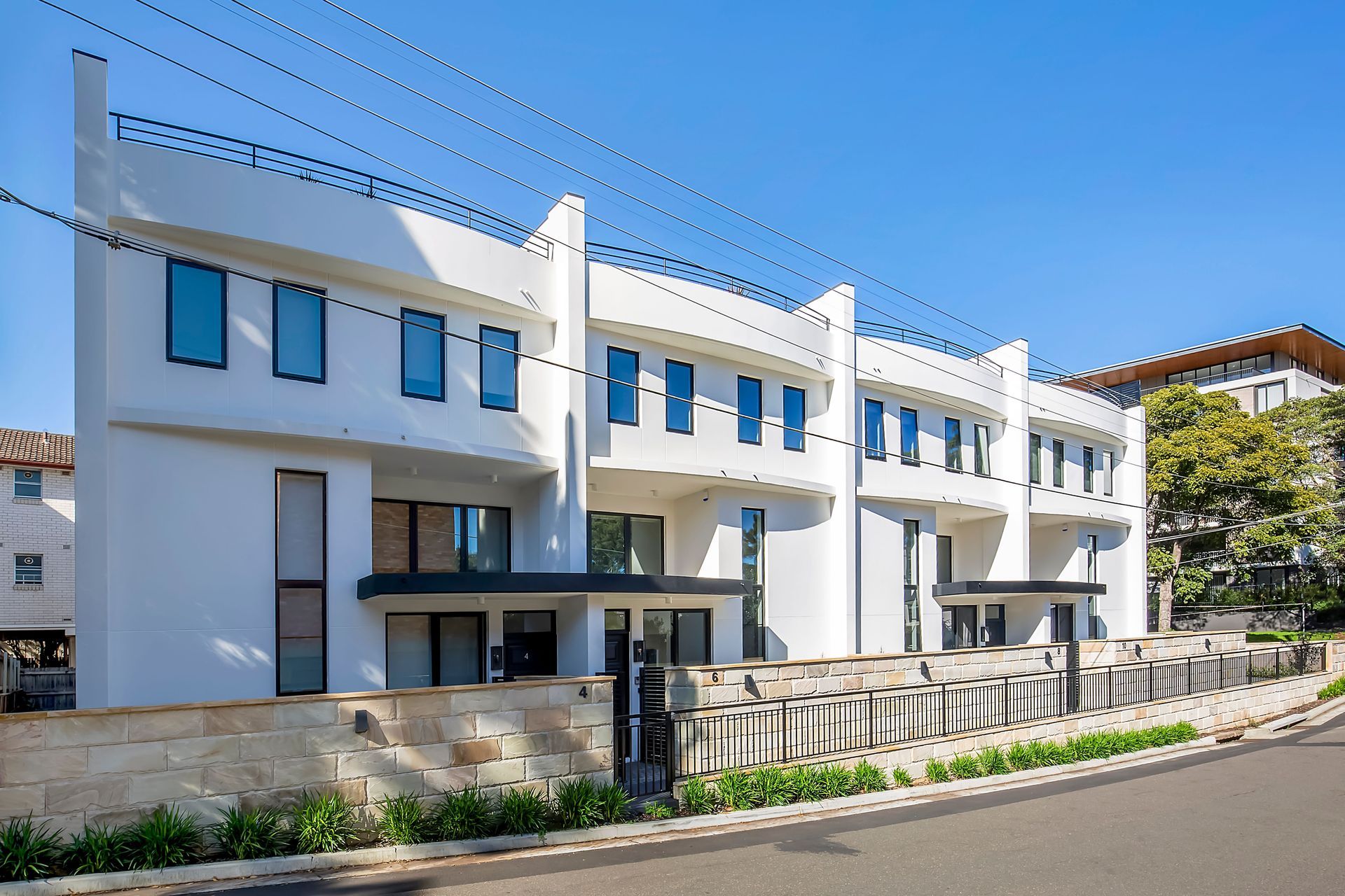 The inviting entrances of these townhouses in Lane Cove. Photography: by Real Studios.