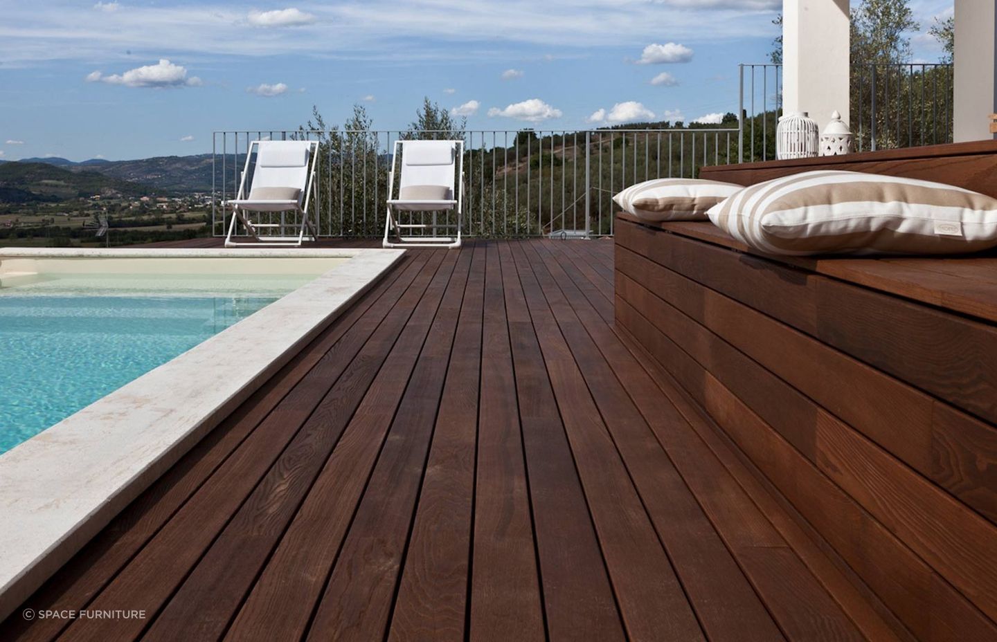 Timber decking can be used around pools.