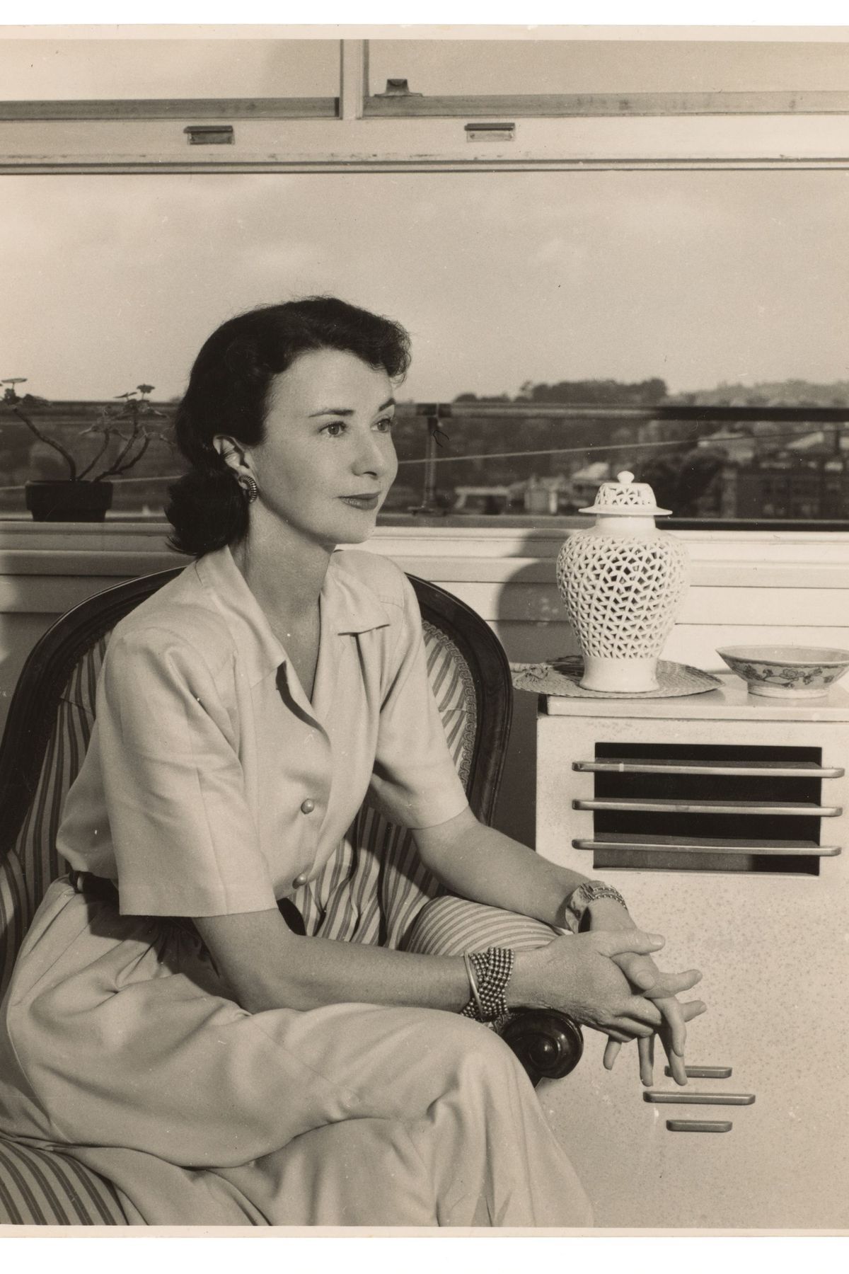 Photograph of Margaret Lord in her Potts Point Unit by Laurence Le Guay and John Nisbett sourced from the Museum of Applied Arts and Sciences.