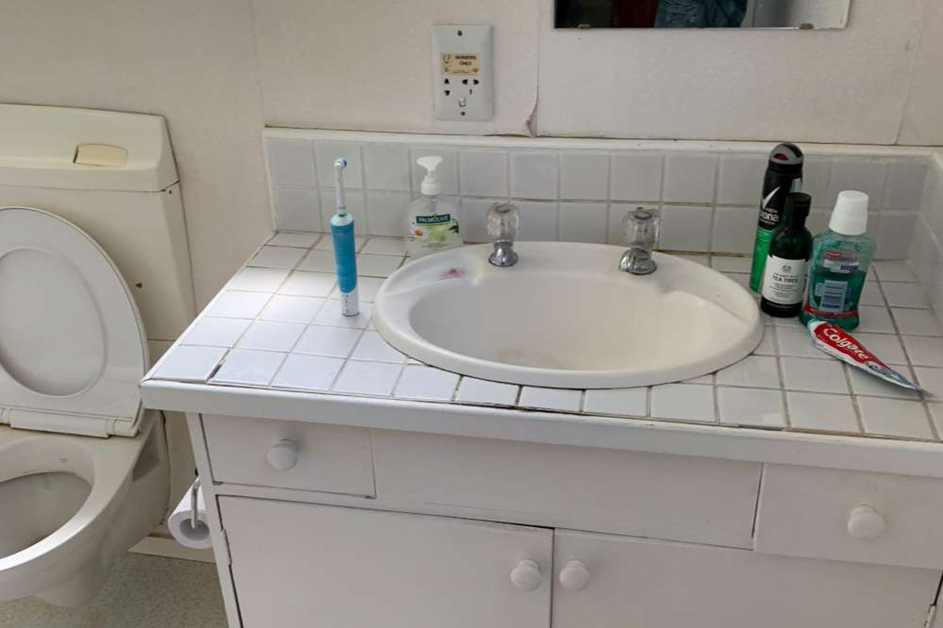 Before we renovated the bathroom in Hillsborough - bathroom was old and shabby and the client needed to spruce it up. 