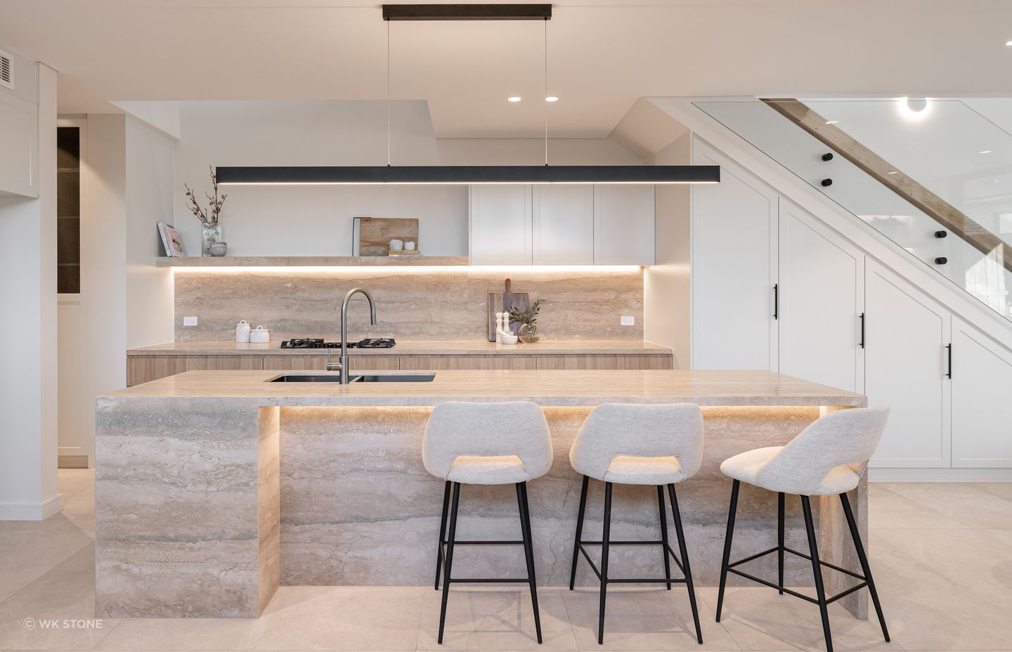 Travertine is a great material for the whole kitchen, including floor tiles.