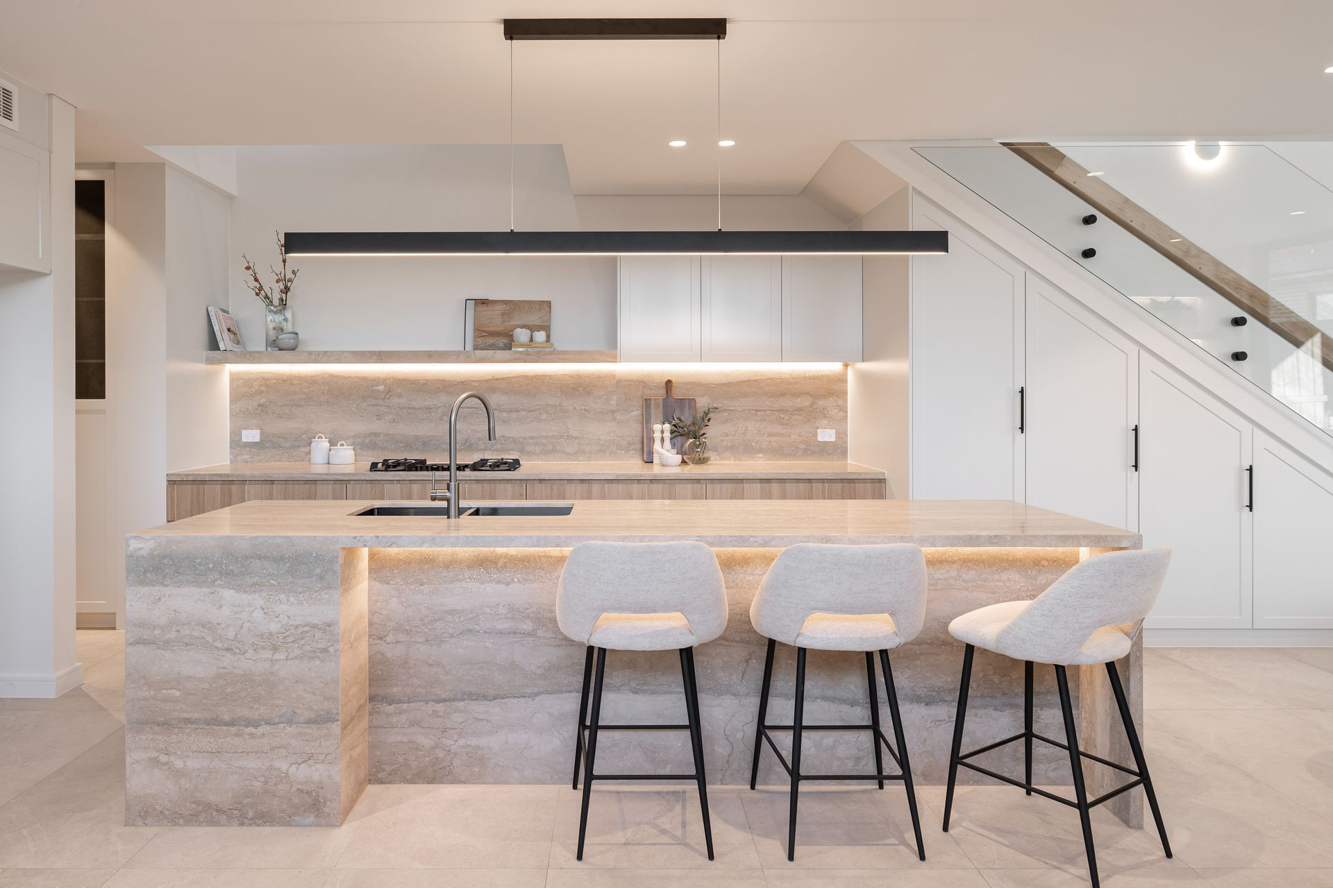Travertine is a great material for the whole kitchen, including floor tiles.
