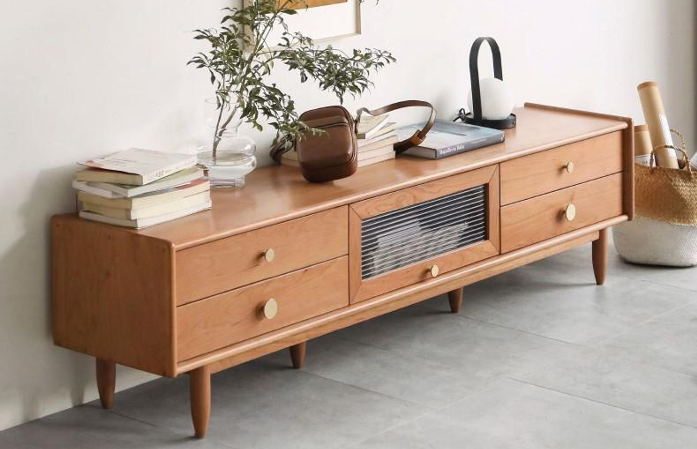 Constructed from 100% solid American cherry hardwood, the Modern TV-Media Stand from Oak Furniture Store is a perfect example of a solid traditional piece anchoring a modern space.