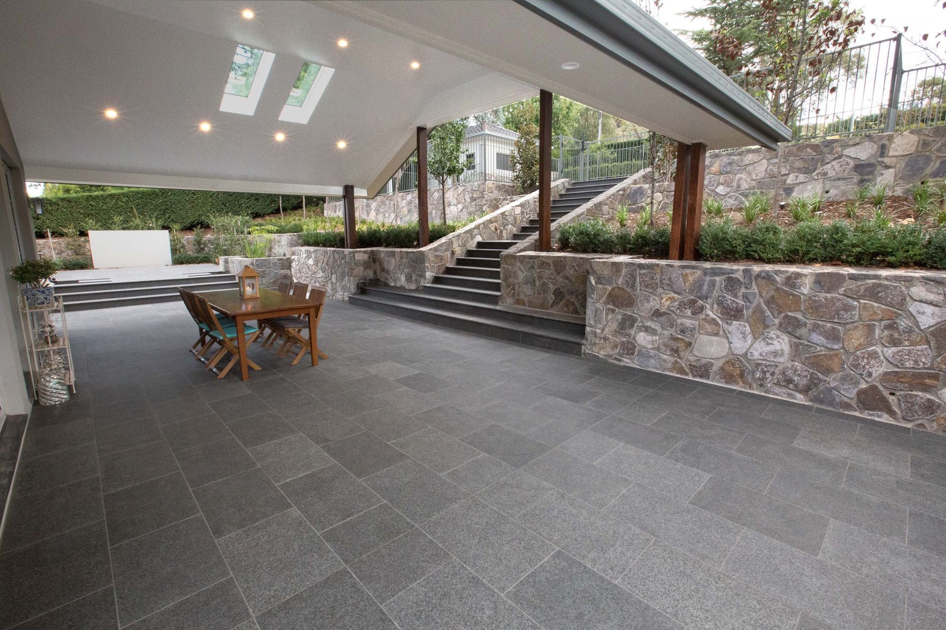 Granite can be used as an outdoor floor tile material.