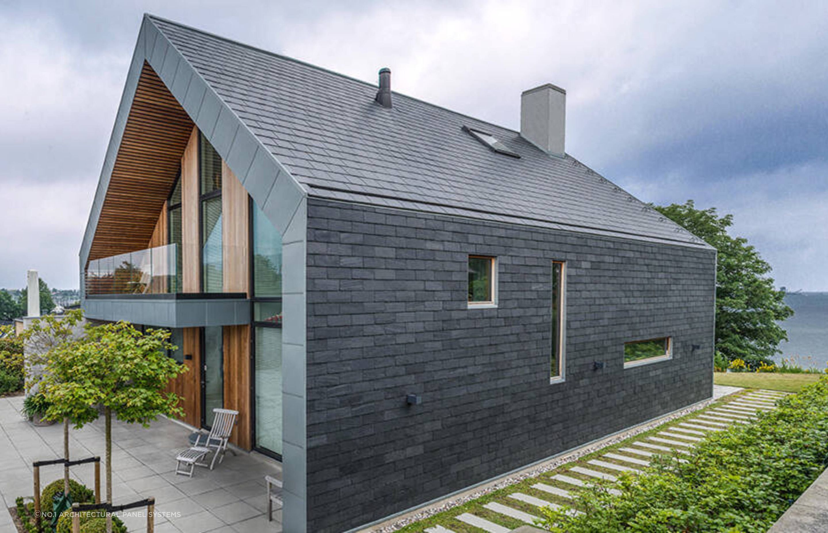 A new slate roof gives a home a unique finish.