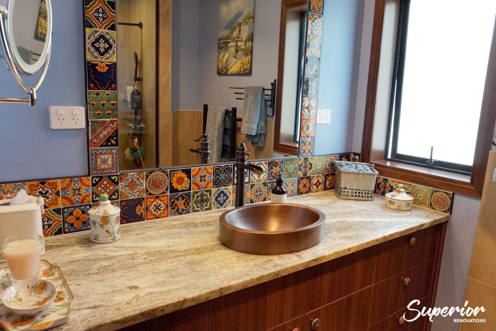 Mary Stuart’s Spanish style bathroom in Stanmore Bay features blue painted walls and colourful mosaic tiles to add a ‘pop’ of colour to her bathroom