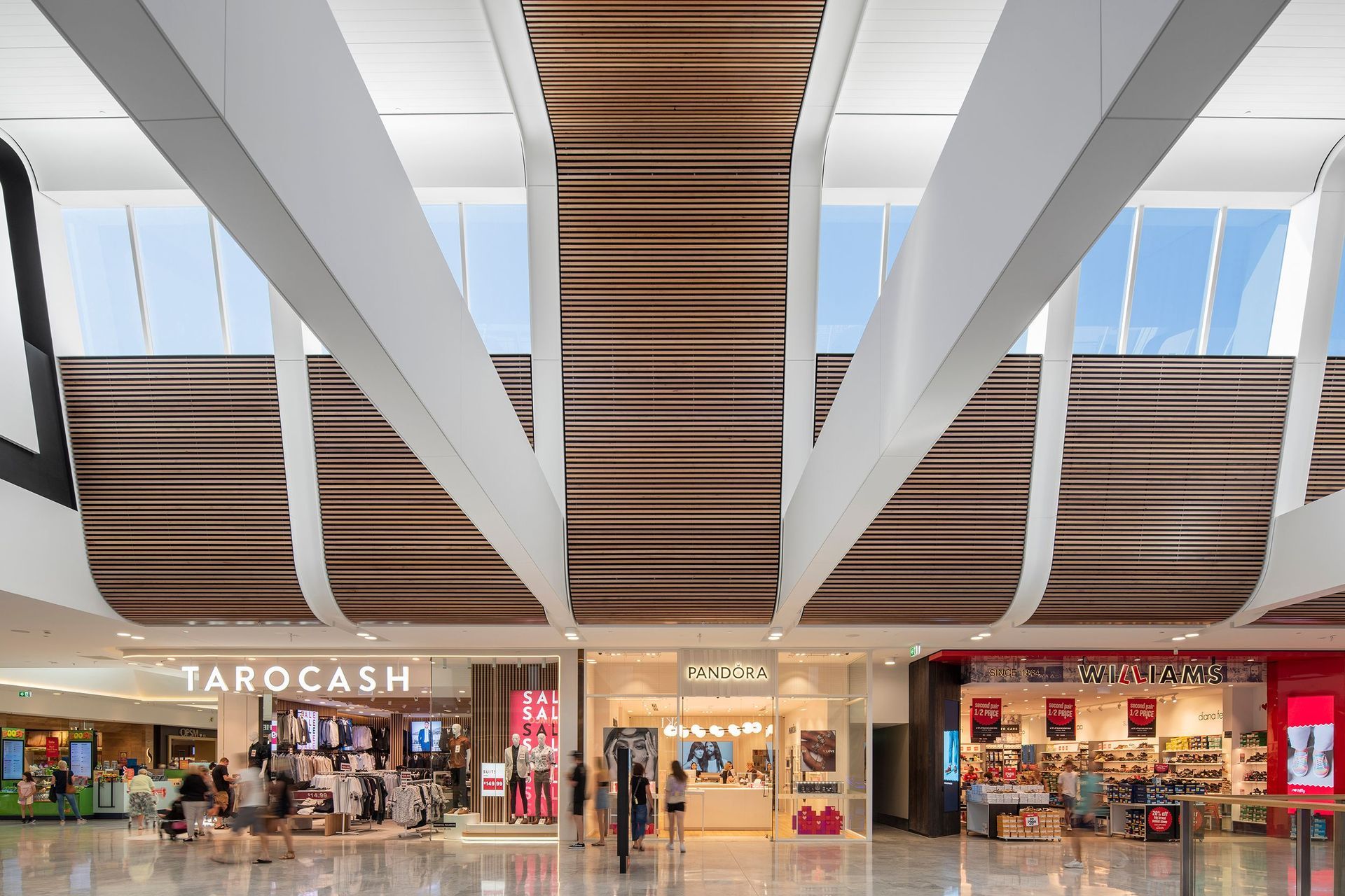 Above: Tea Tree Plaza in South Australia have installed Screenwood acoustic PANLES to assist in reducing reverberation in a noisy shopping centre environment.