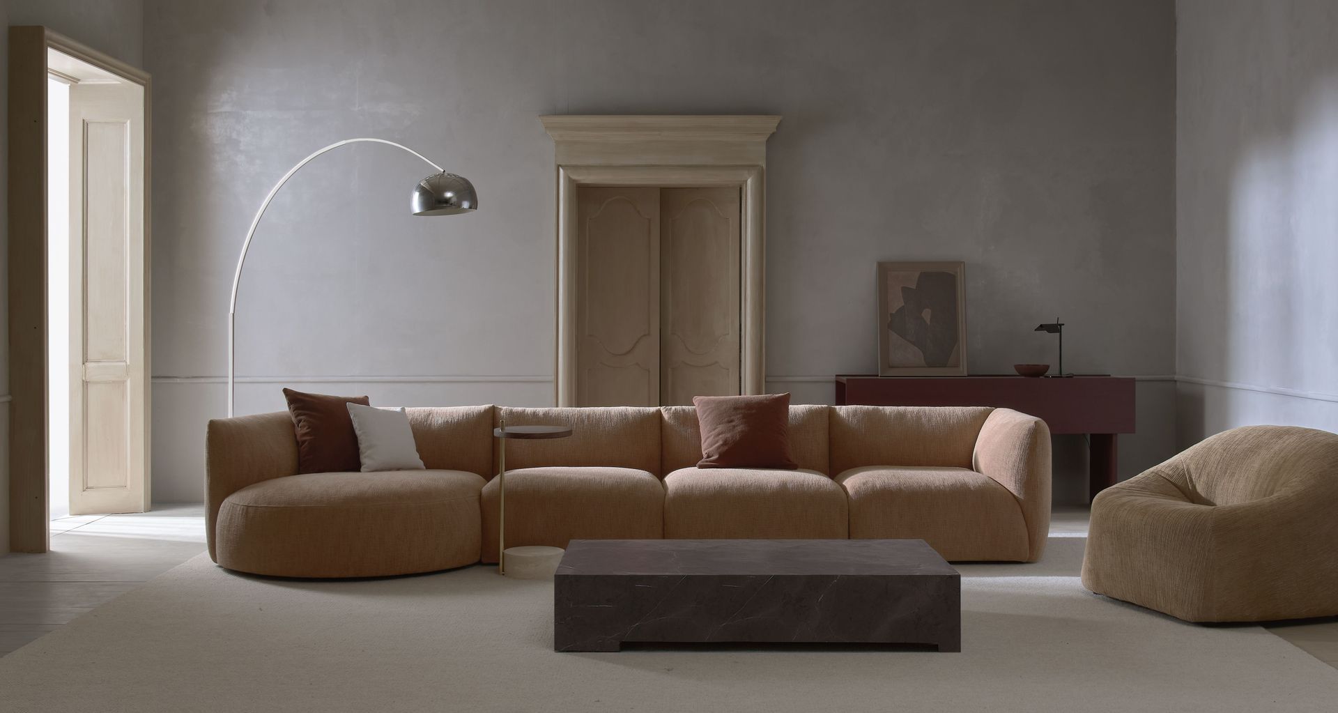 Slipper sofa, Alchemy coffee table, Arbor lounge chair and Society side table for Natadora