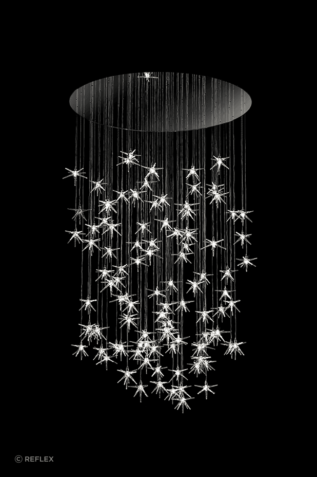 Stella Chandelier with pendant stars in blown borosilicate glass. Composition, quantity and length are customisable