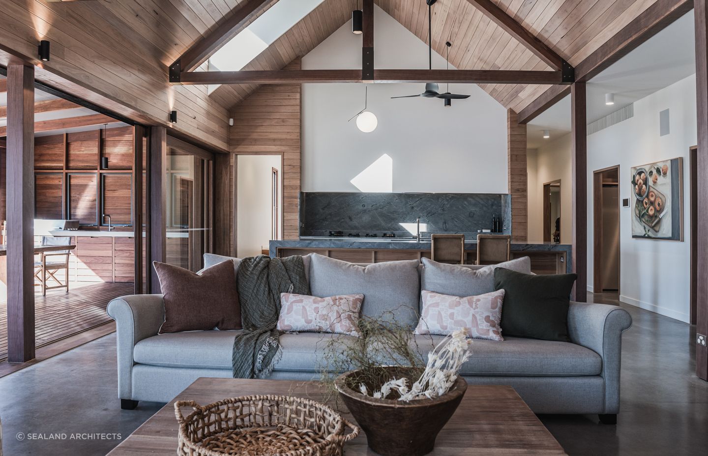 Rustic open-plan living areas offer families a spacious and versatile environment, blending functionality with a timeless, rugged style.