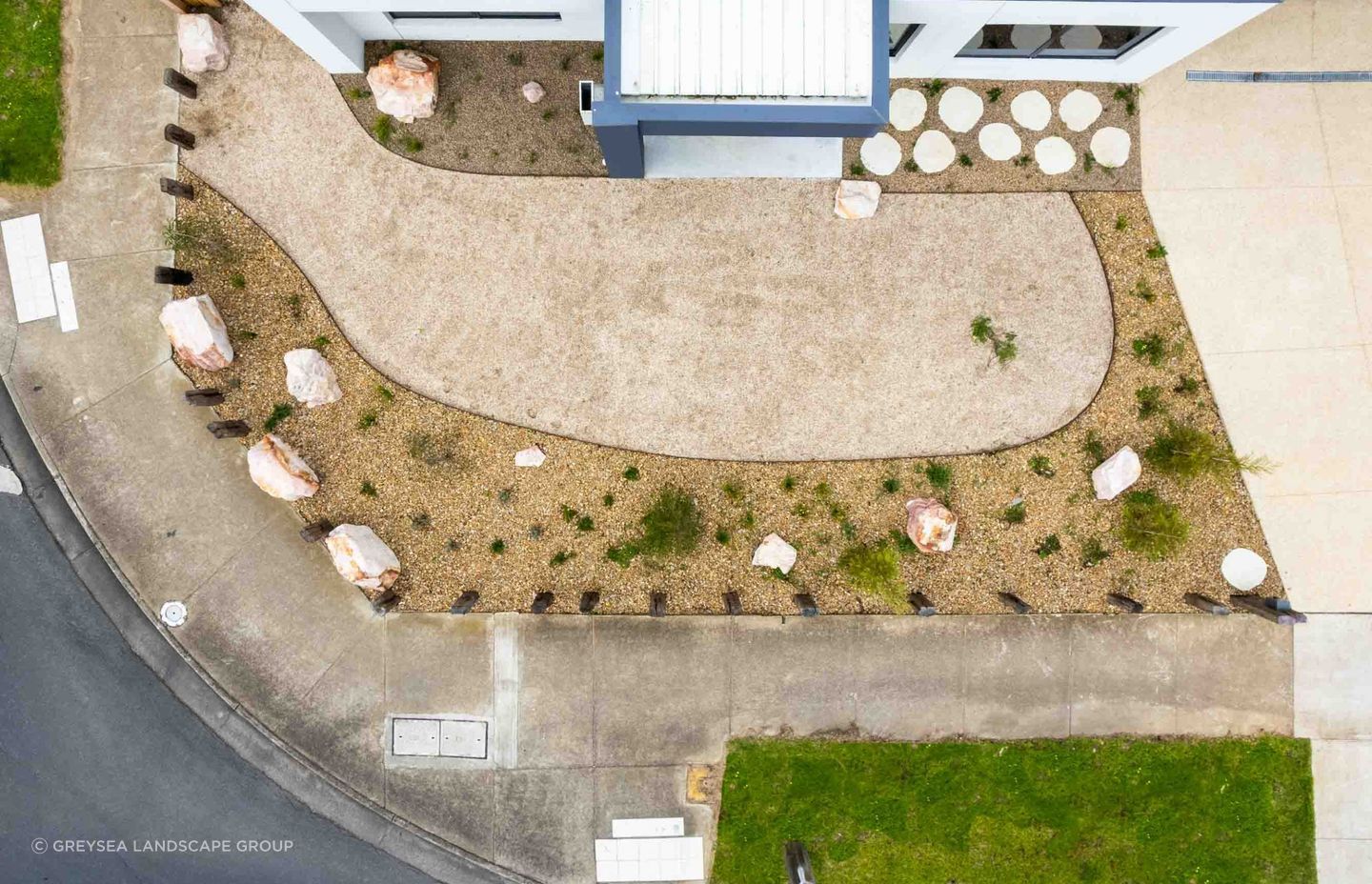 You don't need to overload your front garden in order to achieve the look you want