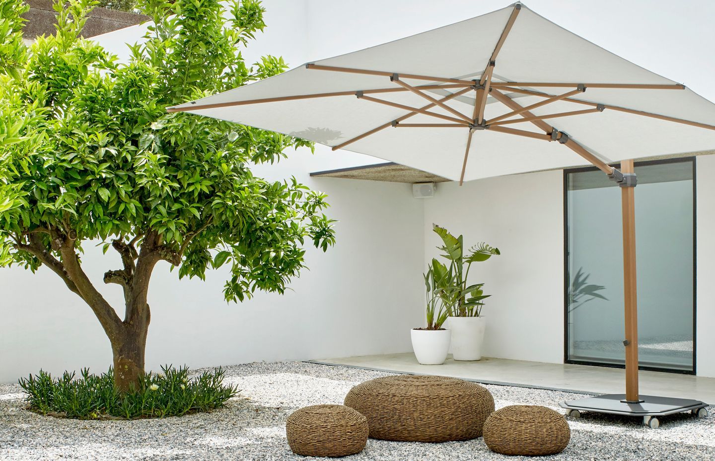 The stylish LUX 301 Outdoor Umbrella by Dawson &amp; Co has a 120kg granite base with wheels for excellent stability.