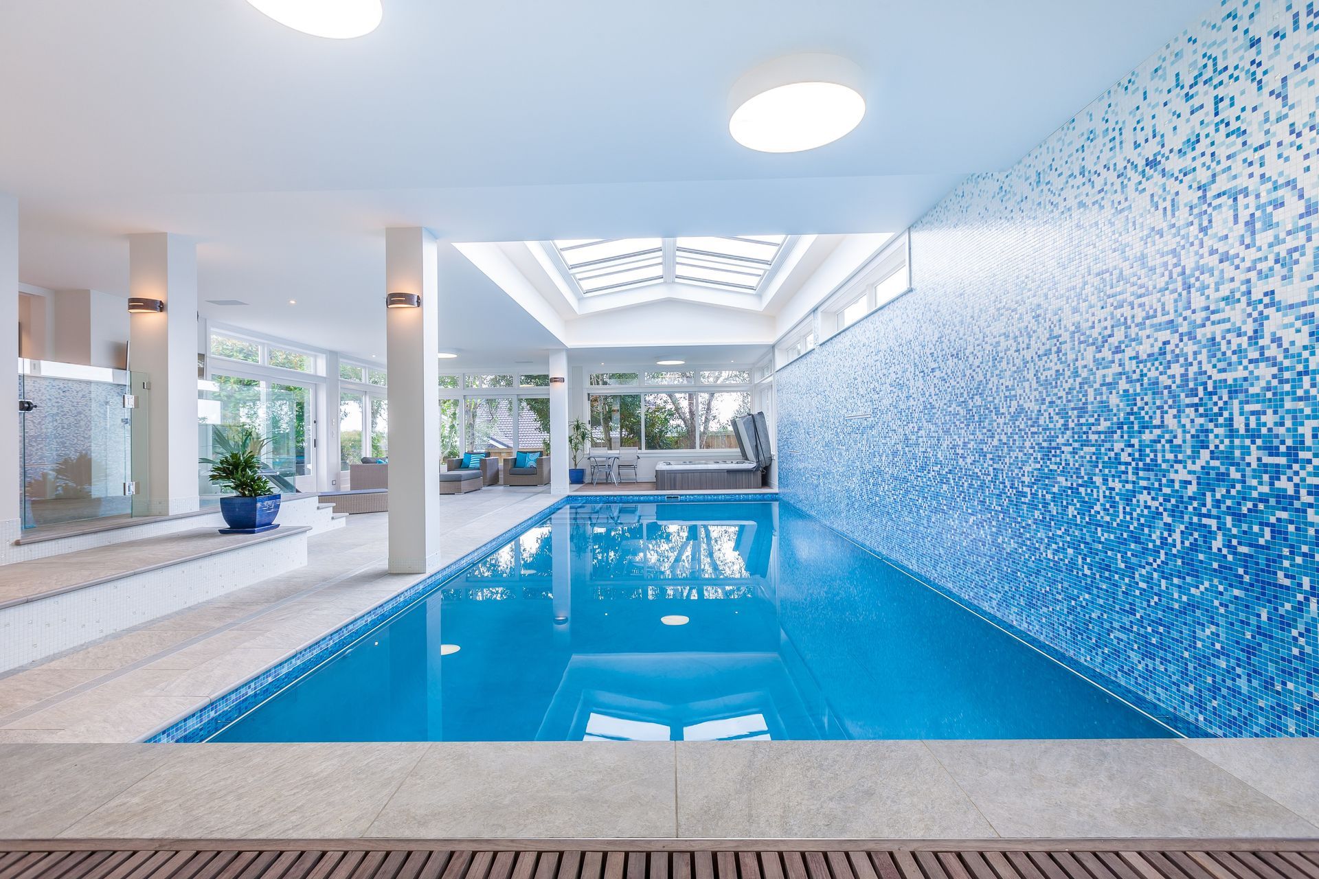 Indoor/outdoor pools are a way to ensure the pool area can be used in all seasons.