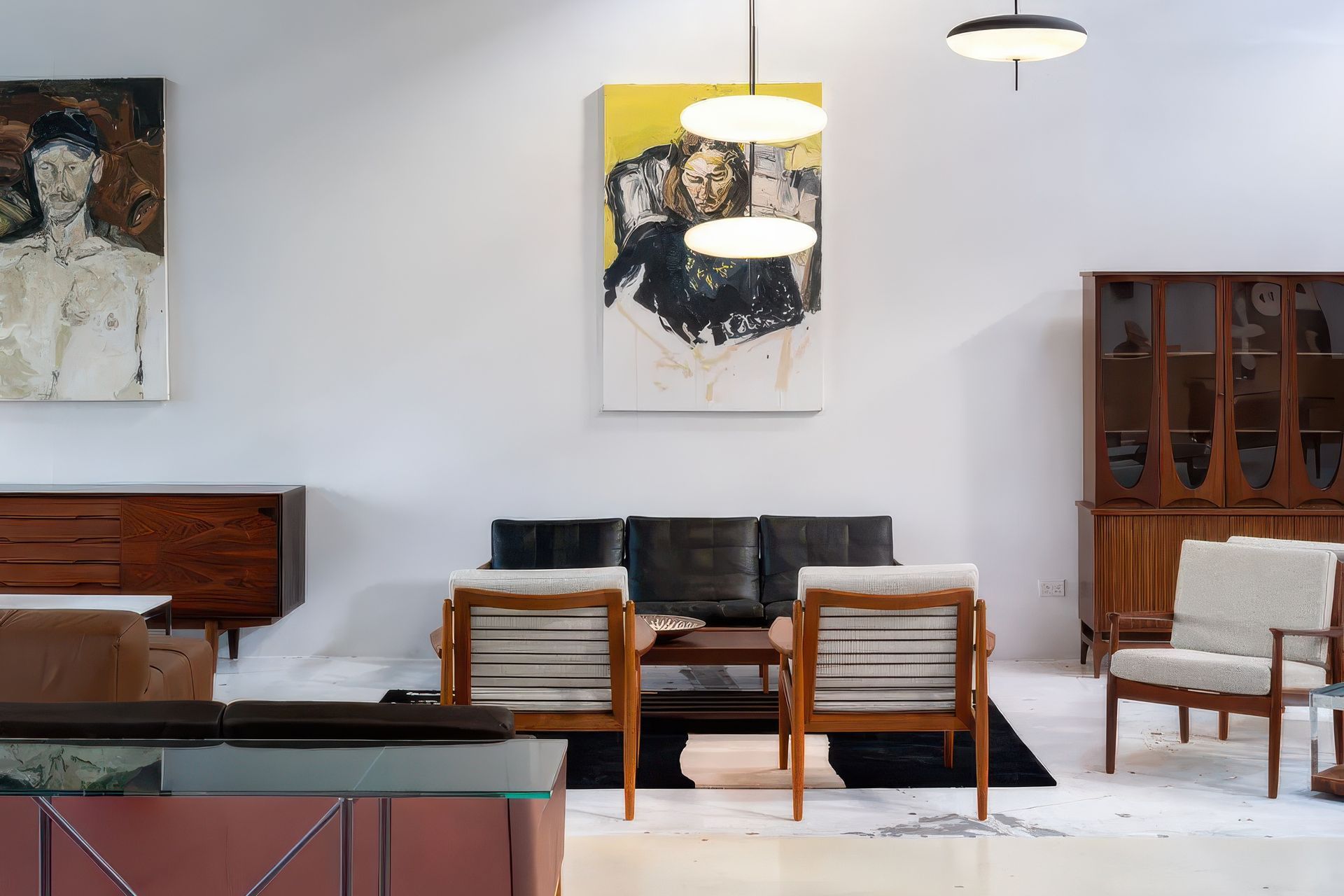 Vintage lounge pieces sit comfortably together with the 2065 Pendant Lamp from Astep and the Vienna Console from OMK.