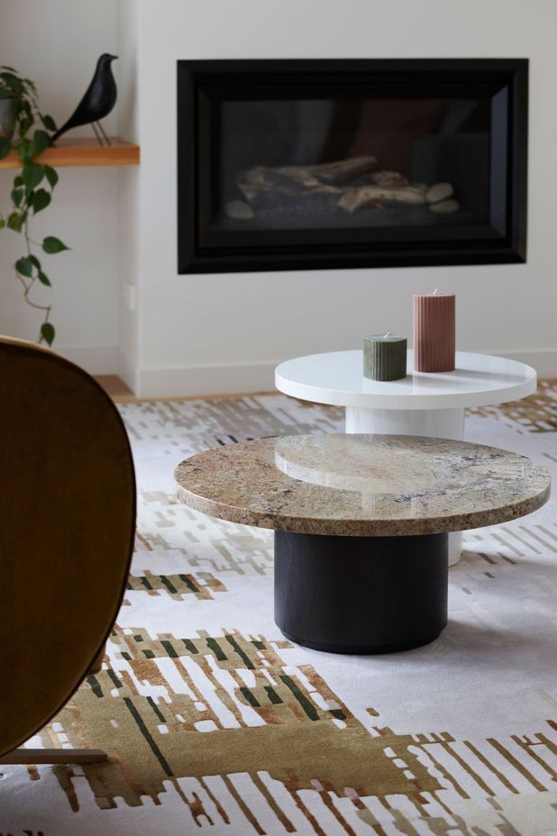 A custom rug designed by Lulu brings the colours of the space together.