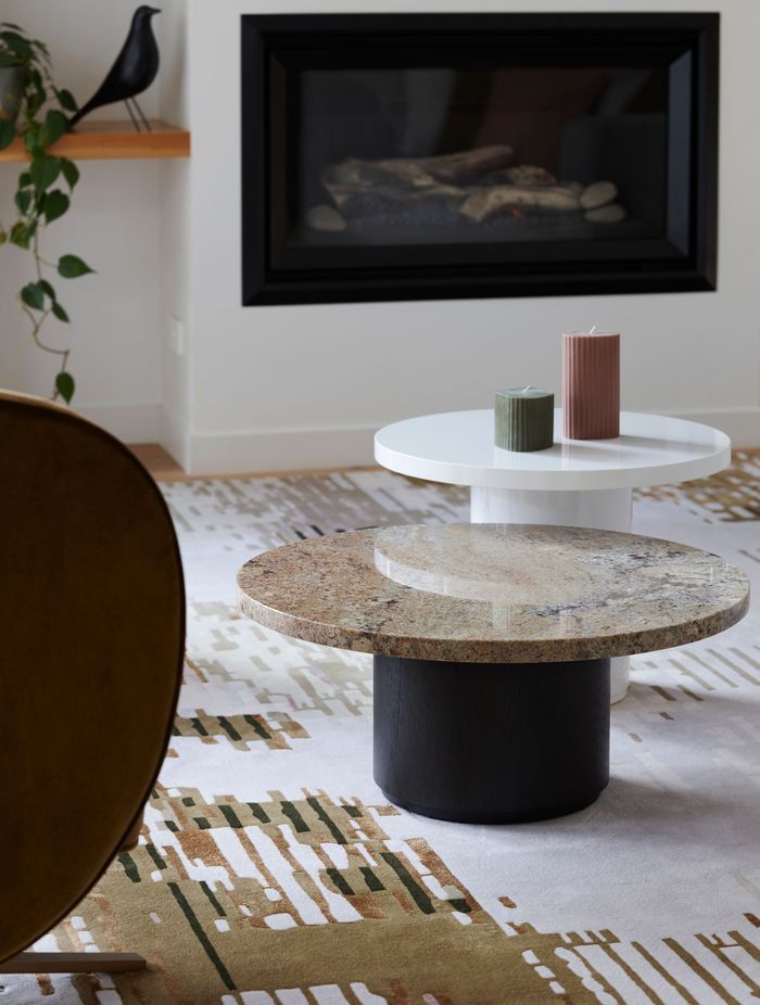 A custom rug designed by Lulu brings the colours of the space together.