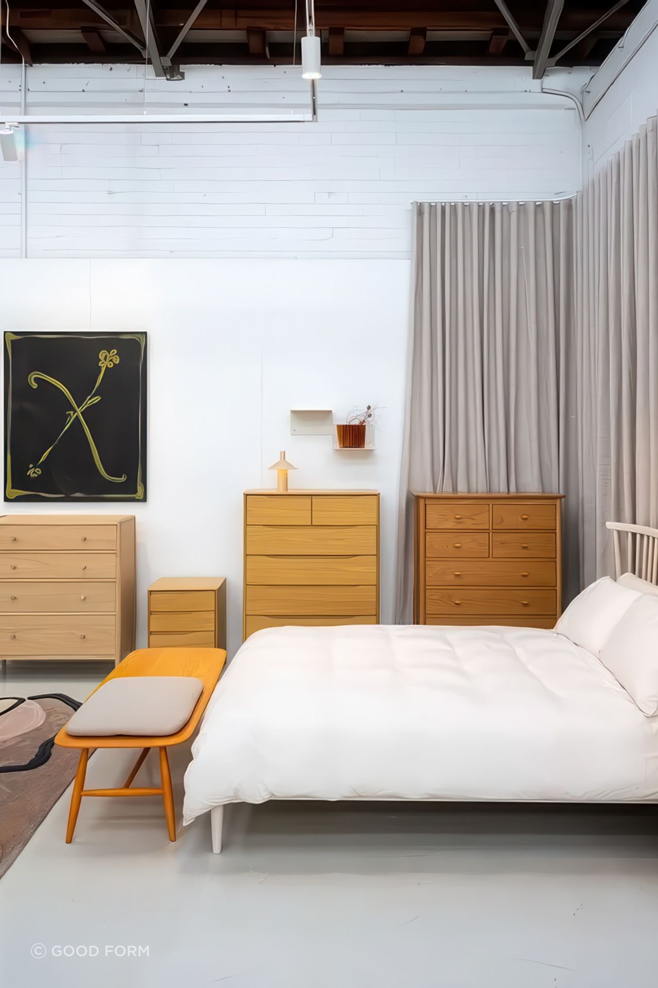 Bedroom Designs from Ercol together with Reclining Figure Rug from Faye Toogood for CC-Tapis and artwork by Lottie Consalvo from Foenander Galleries.