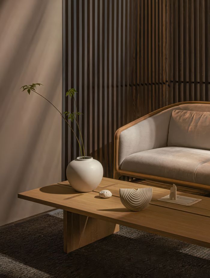 Norman Foster Sofa N-FS01 paired with a slim, rectangular oak coffee table which is not yet released – please enquire for details.