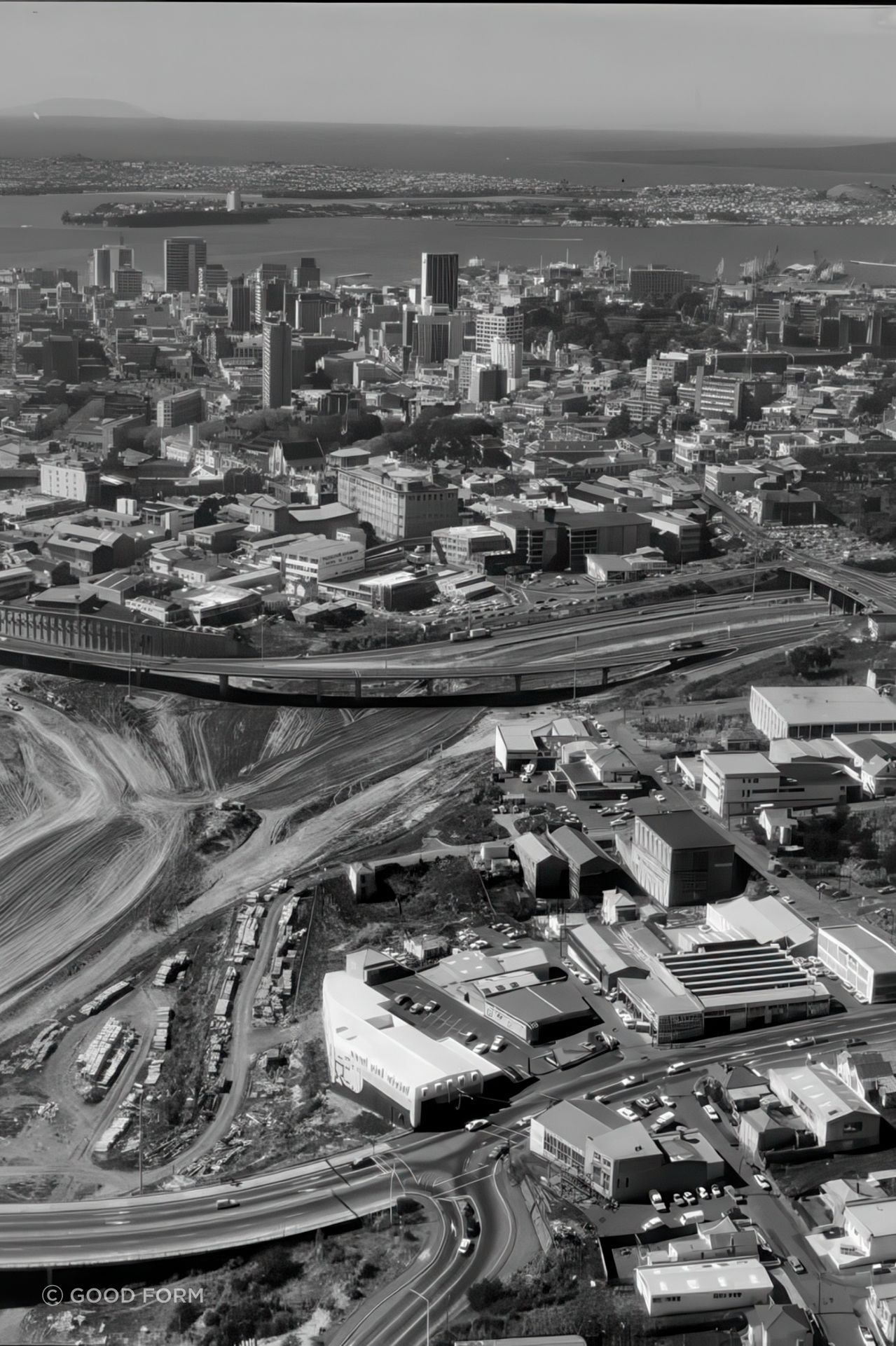 The original building and an aerial view of the epic saw tooth roof, photographed by Whites Aviation in 1978 during the development of Auckland's Spaghetti Junction.