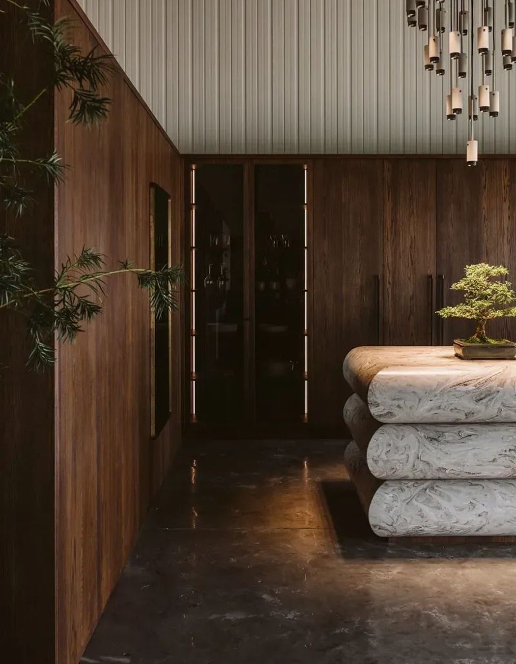 Oak veneer cabinetry boldly features in this award-winning brutalist-style kitchen. | Photography: Gina Fabish