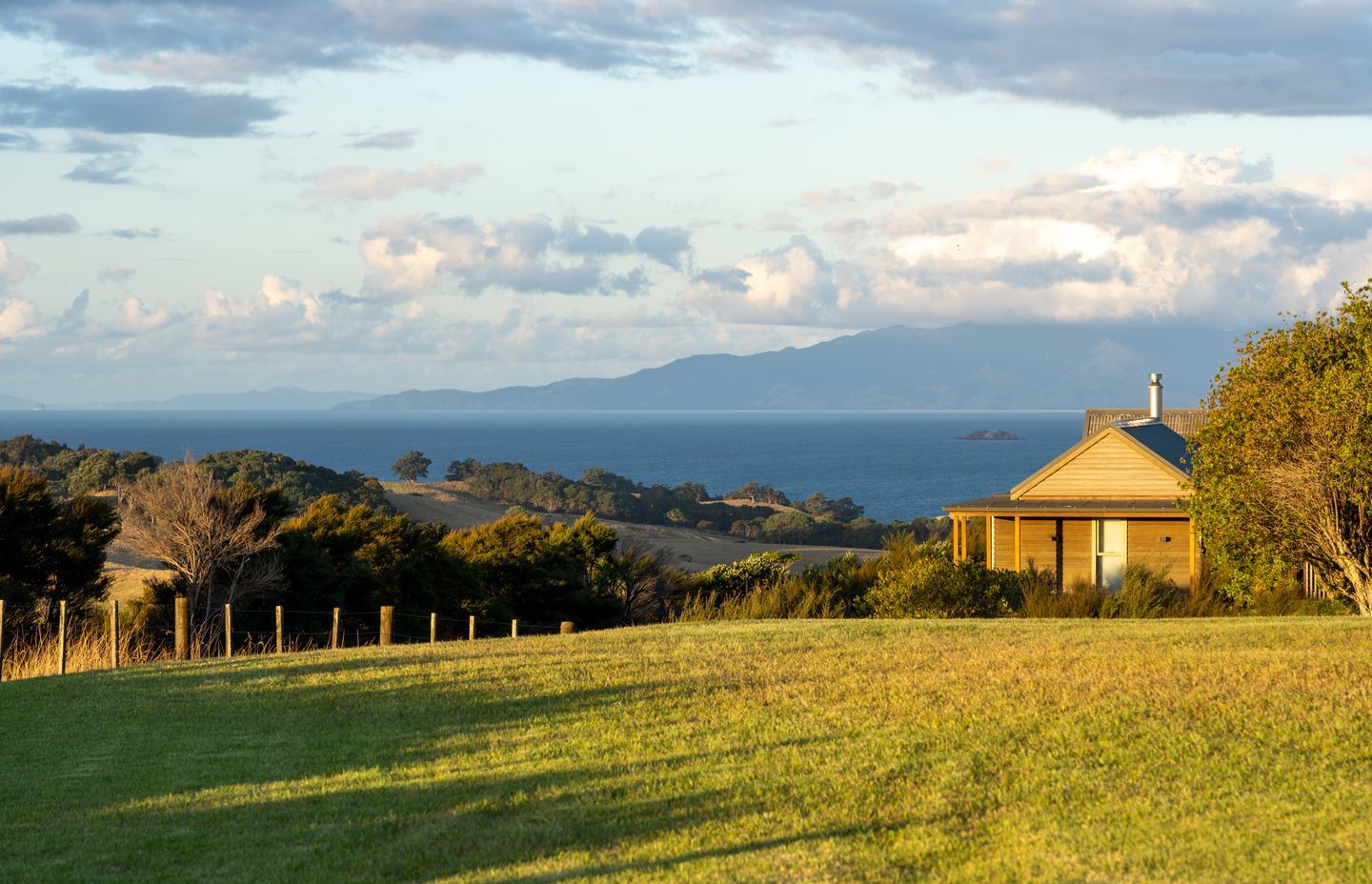 The work of Charissa, The Treehouse rests lightly on a tongue of land on Waiheke Island. Reminiscent of a tramper’s hut, the house is a timeless haven connected closely to the elements.