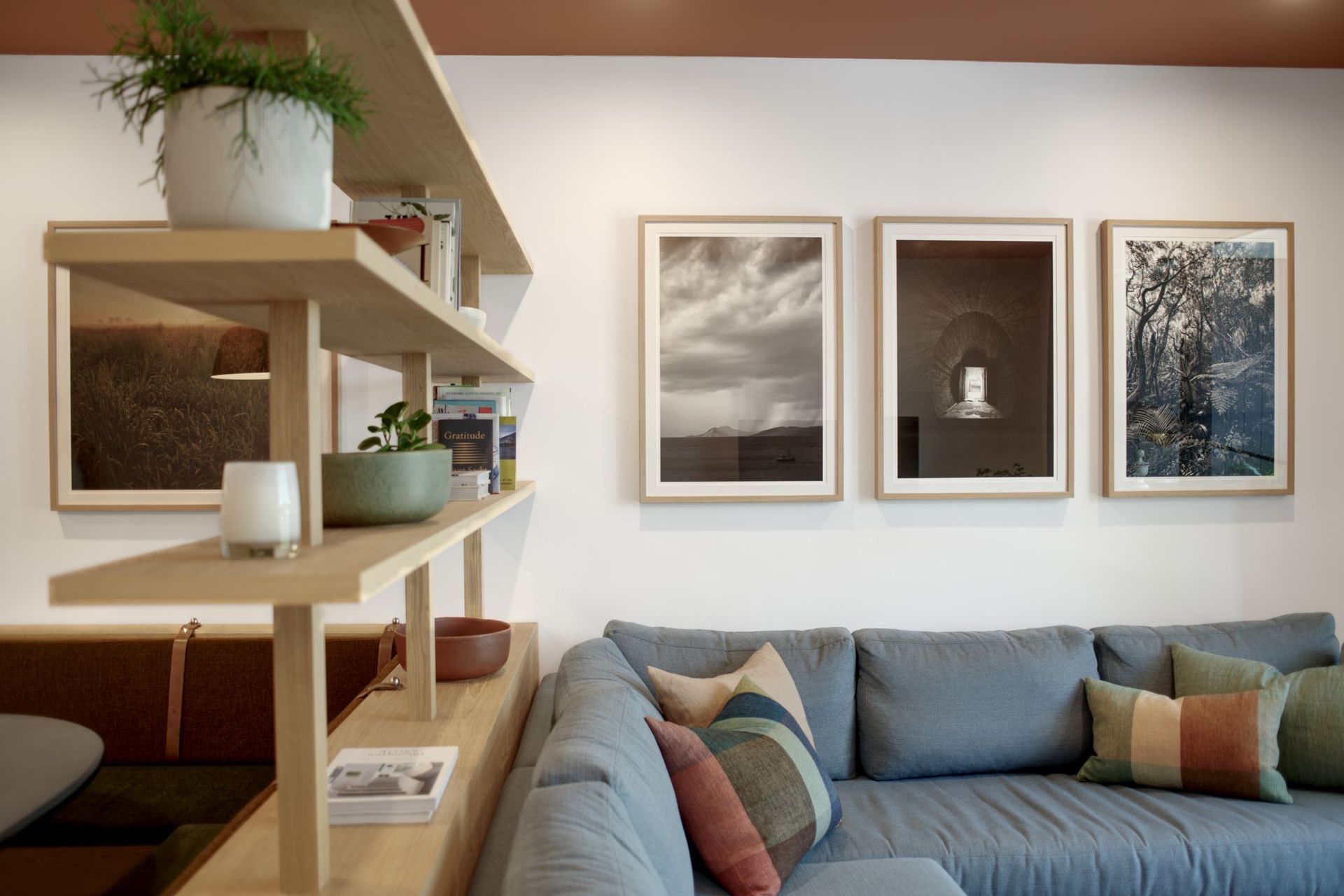 Kanat Studio used the client’s photography throughout this apartment to add a personal touch | Photography by Ben Rowsell