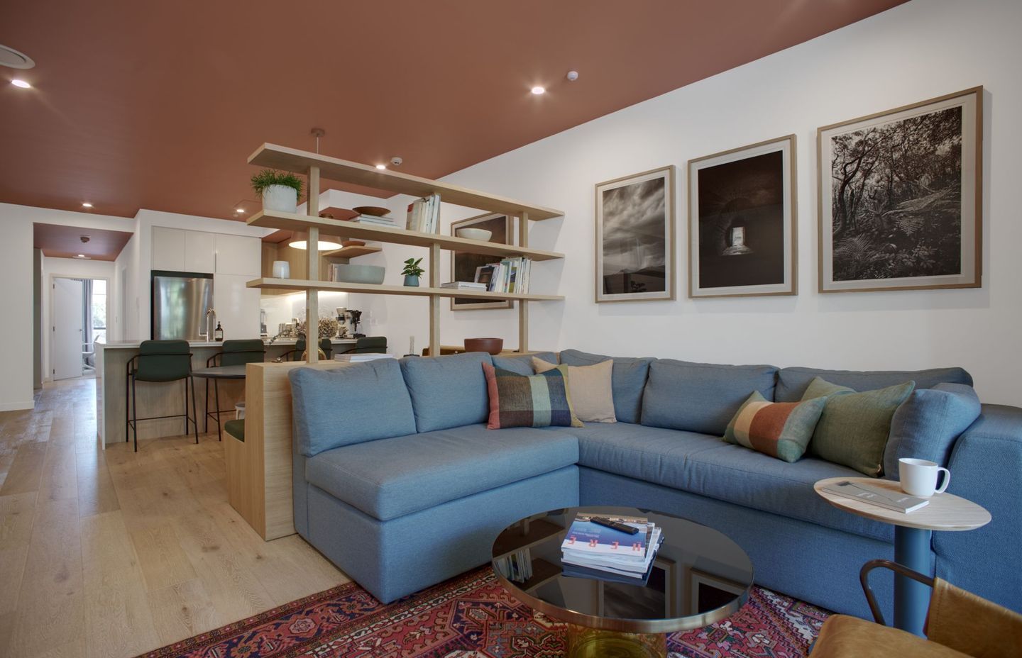 In the Kimiora Apartment project, Kate and Natalia chose a terracotta paint colour for the ceiling to create an intimate atmosphere | Photography by Ben Rowsell