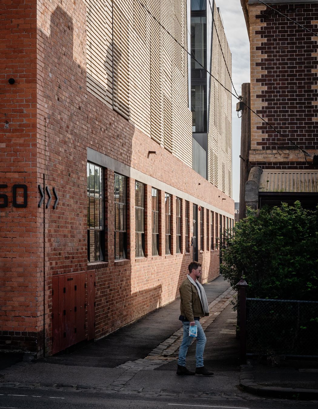 Original brick has been retained at ground level, effortlessly met by the Brick Inlay above.