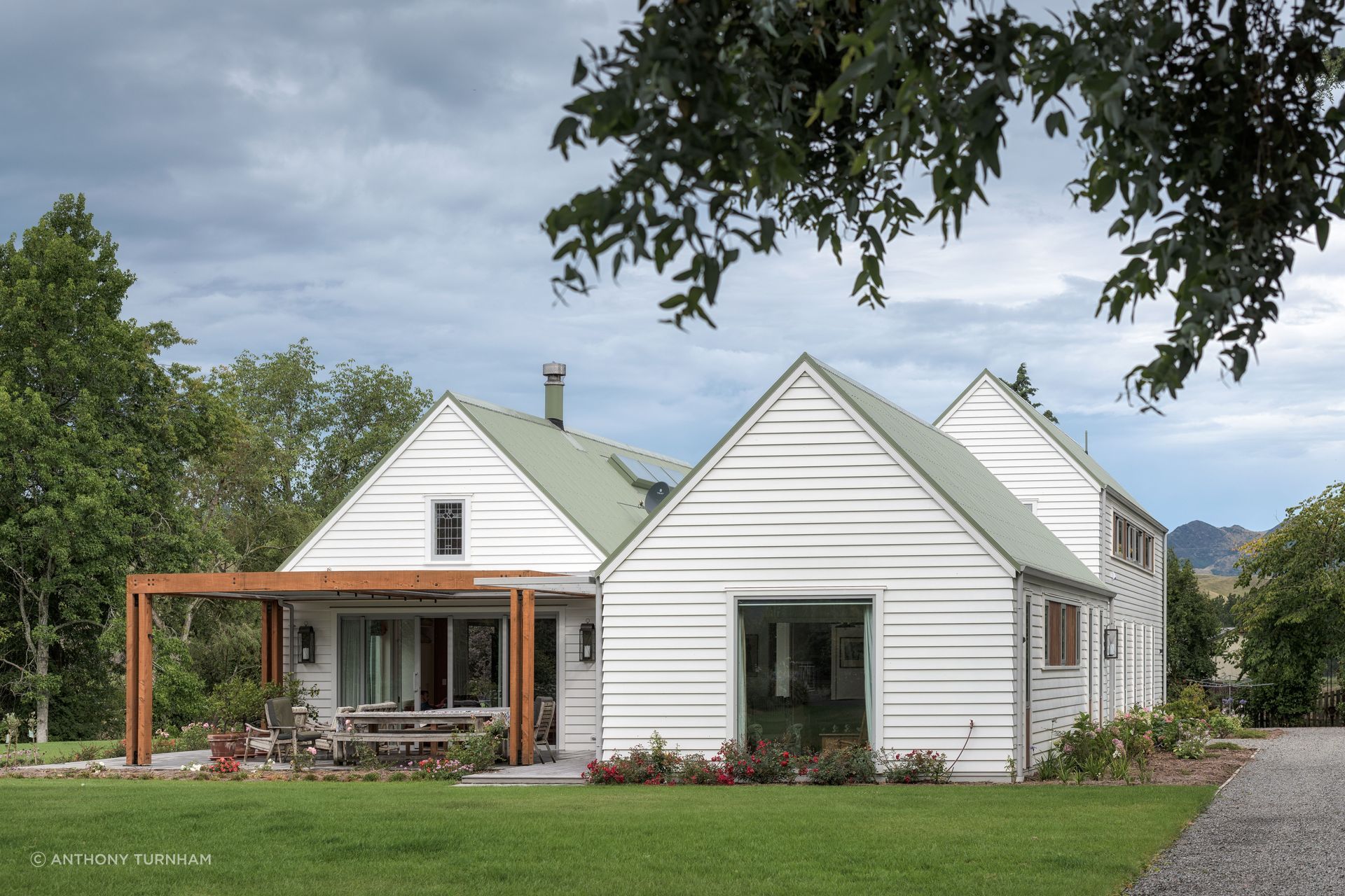 The three main forms of the new homestead. The site is quite remote so builders and contractors would stay during the week in shearers’ quarters during the build. The small leadlight window was saved from the earthquake-damaged house and reused here.