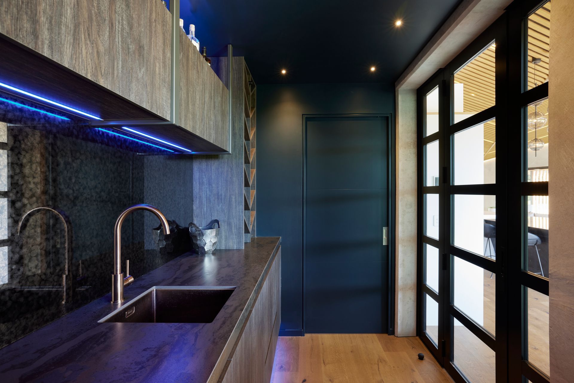 The bar can be accessed from the scullery or via the outdoor entertainment area.