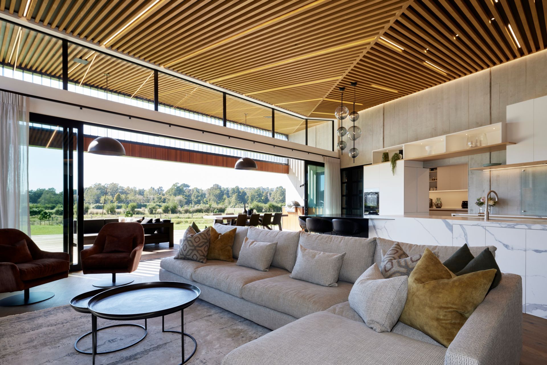The cedar ceiling extends from inside to out.
