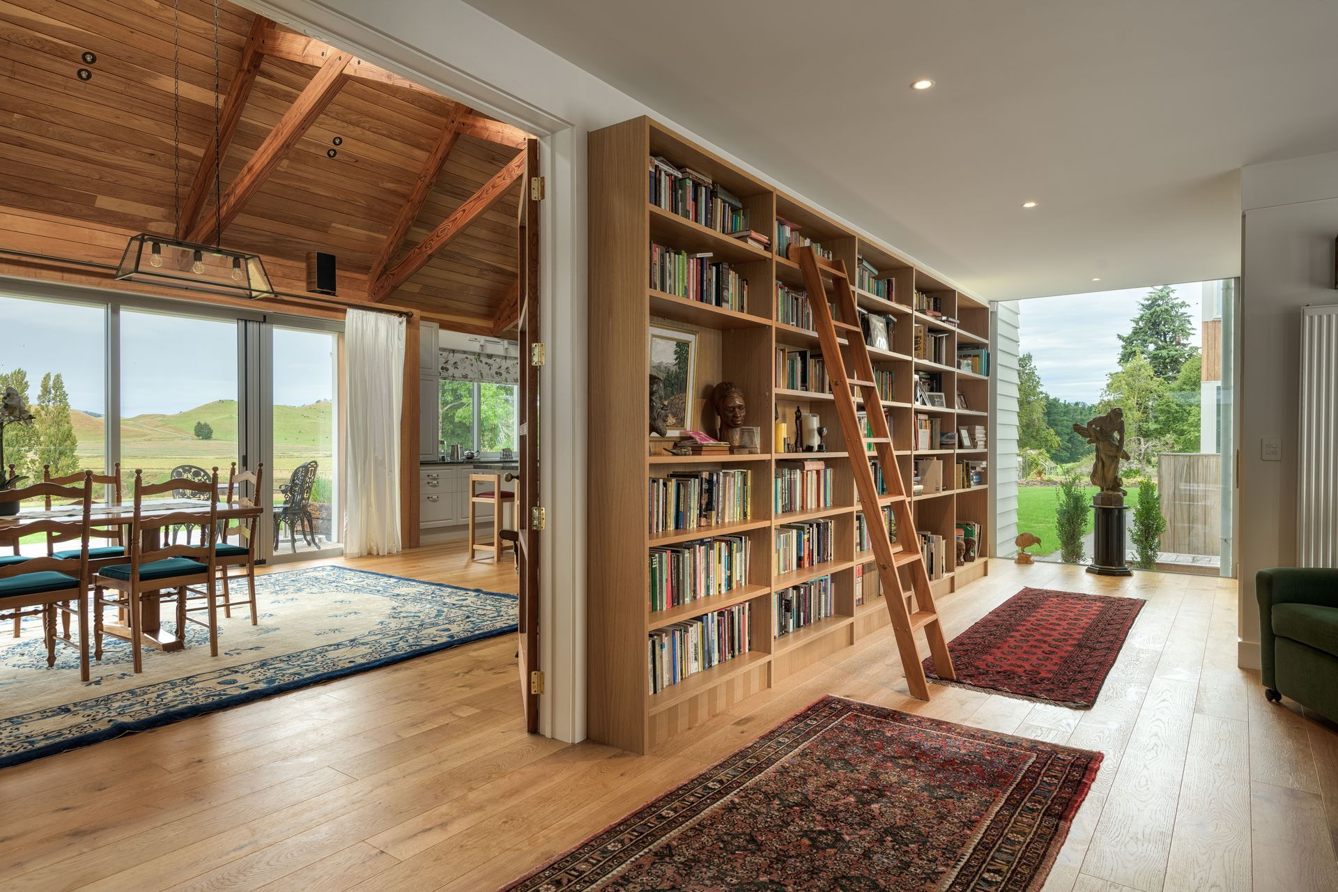 The homeowners have an extensive book collection, which is on display in the entrance gallery. The idea was to engage with the books every day rather than having a traditional library tucked away.