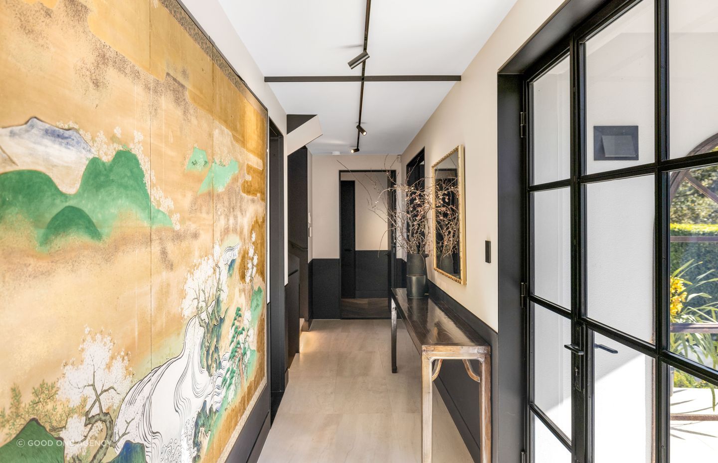 The entry hall features a two-tone treatment.