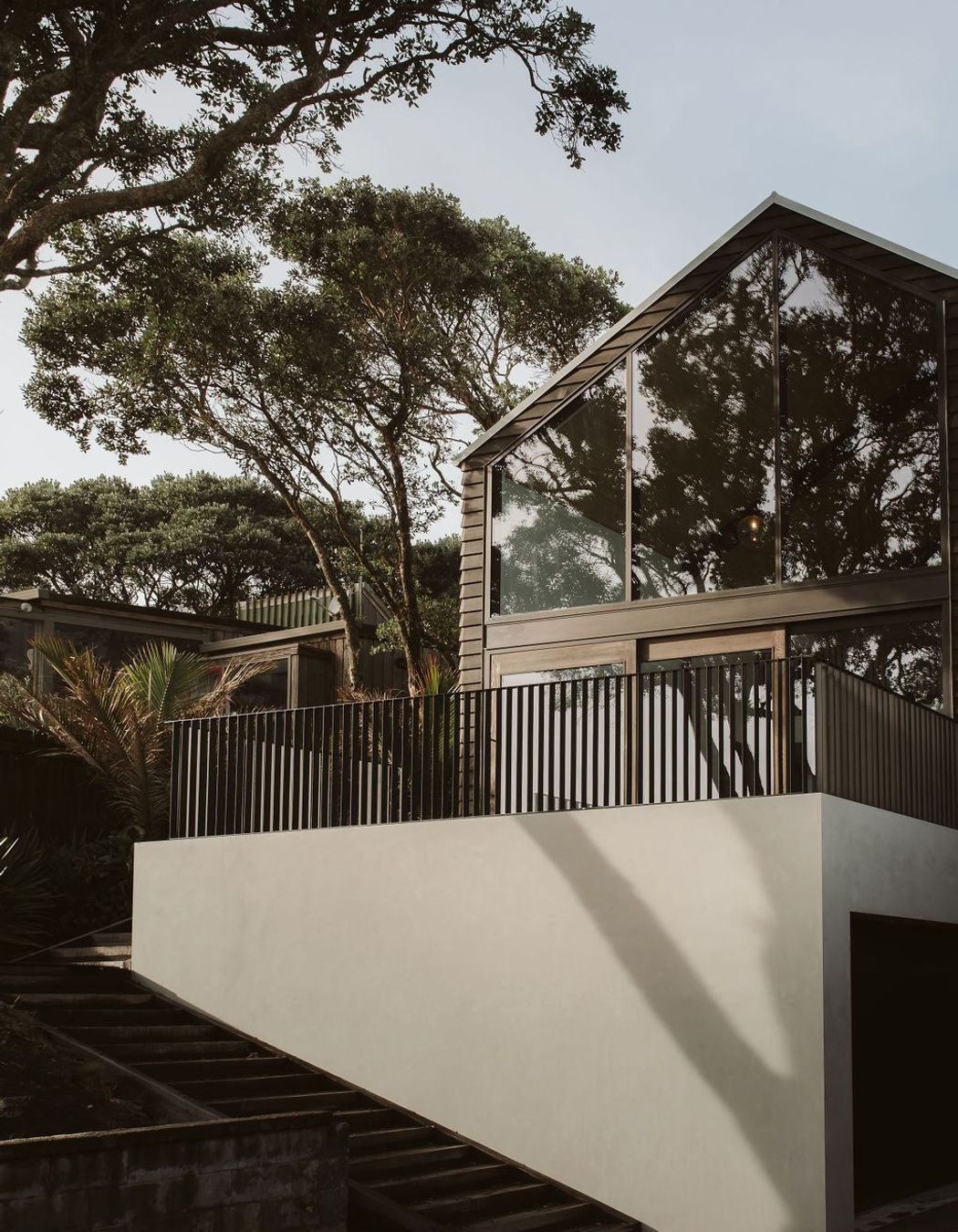 Constructed by Chris Bell Construction and designed by Glenn Brebner and Milca Severo of BOON Architects, this four-bedroom, three-bathroom home in Taranaki has been crafted with timelessness and environmental responsibility in mind.