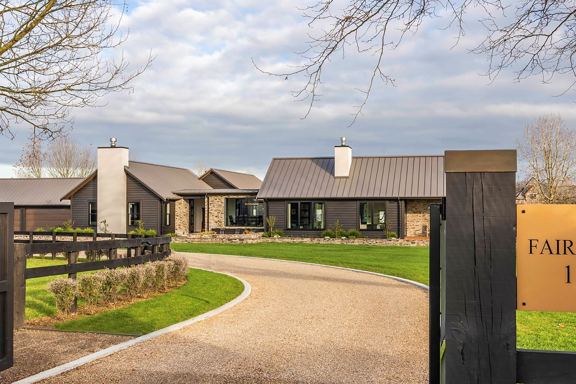 Elements of stone and cedar effortlessly combine with style at Fairwood Home. | Photography: Locus Creative